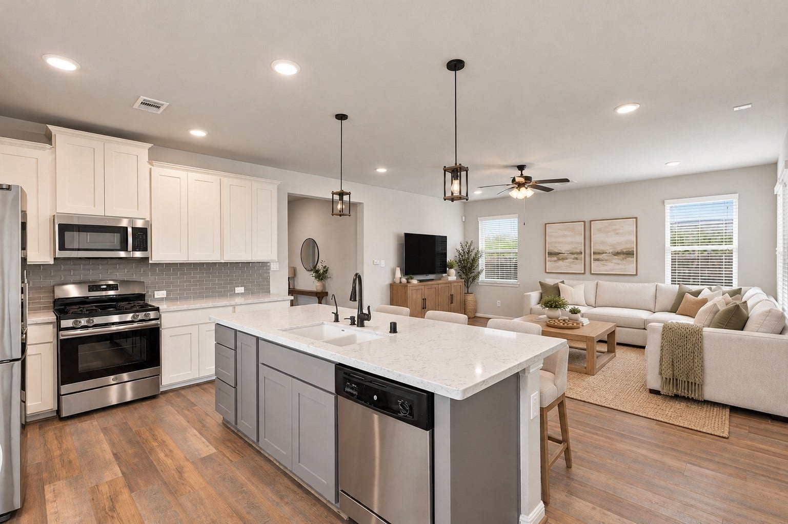 7814 Tindarey Maple Trace, Richmond, TX 77407 Open-concept design connects the kitchen to a bright family room with abundant natural light..**Virtually staged