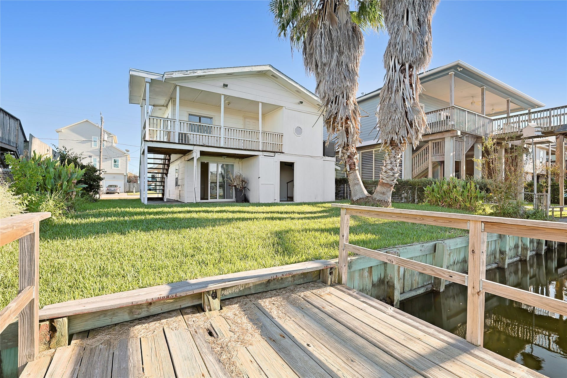 434 Pompano Street, Bayou Vista, TX 77563 Canal front living with your own dock
