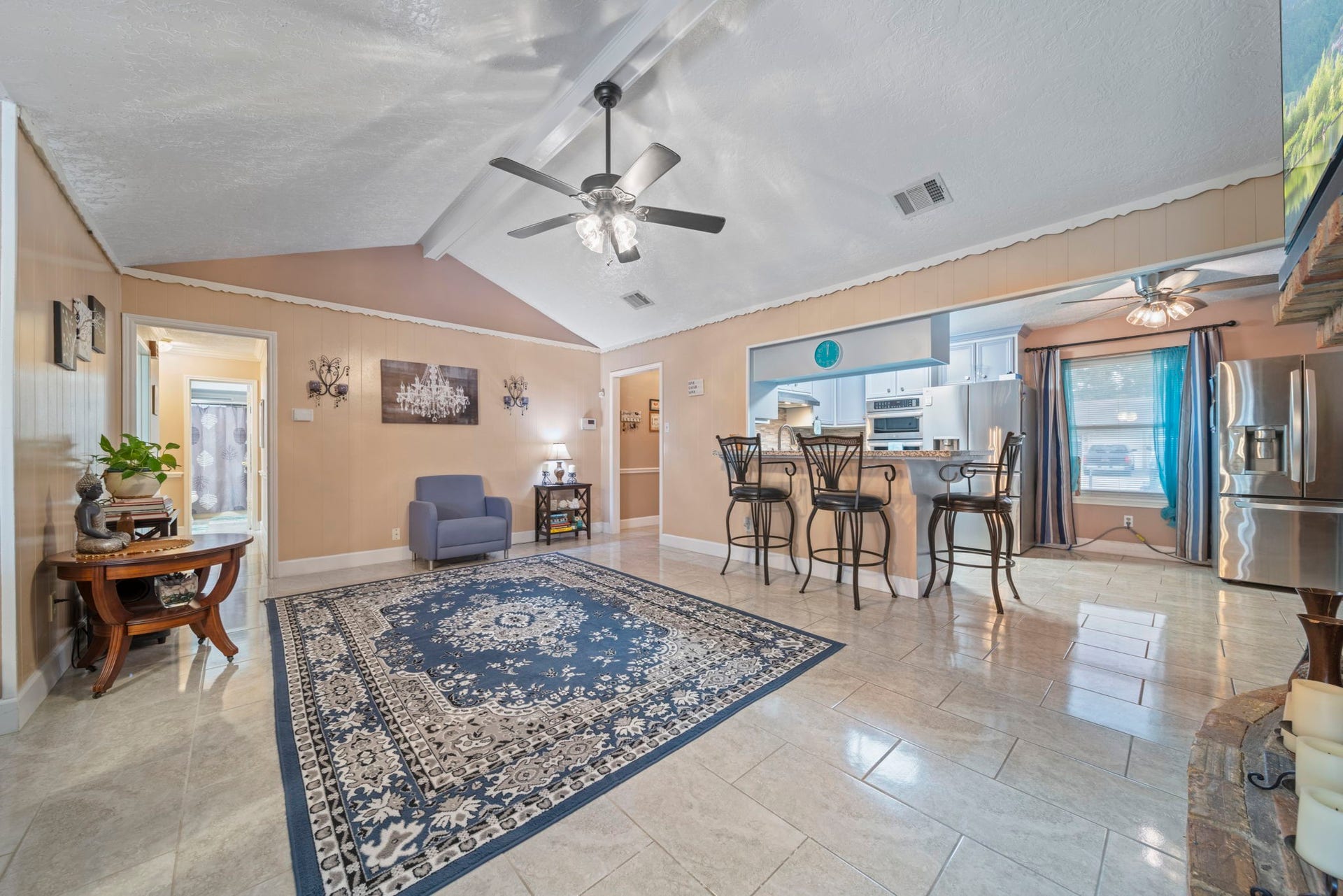 3805 Darling Avenue, Pasadena, TX 77503 The entry leads to the lovely family room, which features high ceilings, tile flooring, a majestic fireplace, and opens to the stunning kitchen.