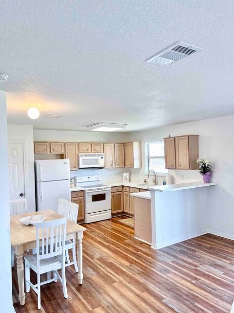 1426 Bluewater Highway, Surfside Beach, TX 77541 in kitchen dining