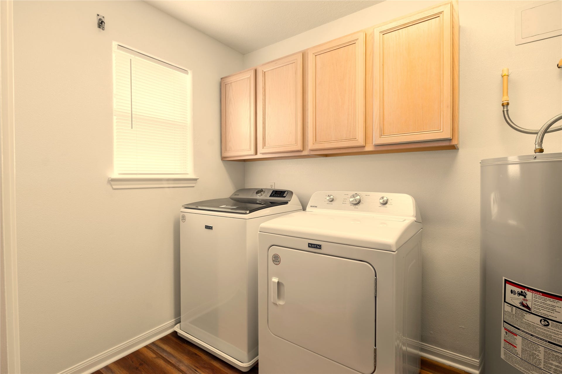 1426 Bluewater Highway, Surfside Beach, TX 77541 laundry room with an abundance of storage