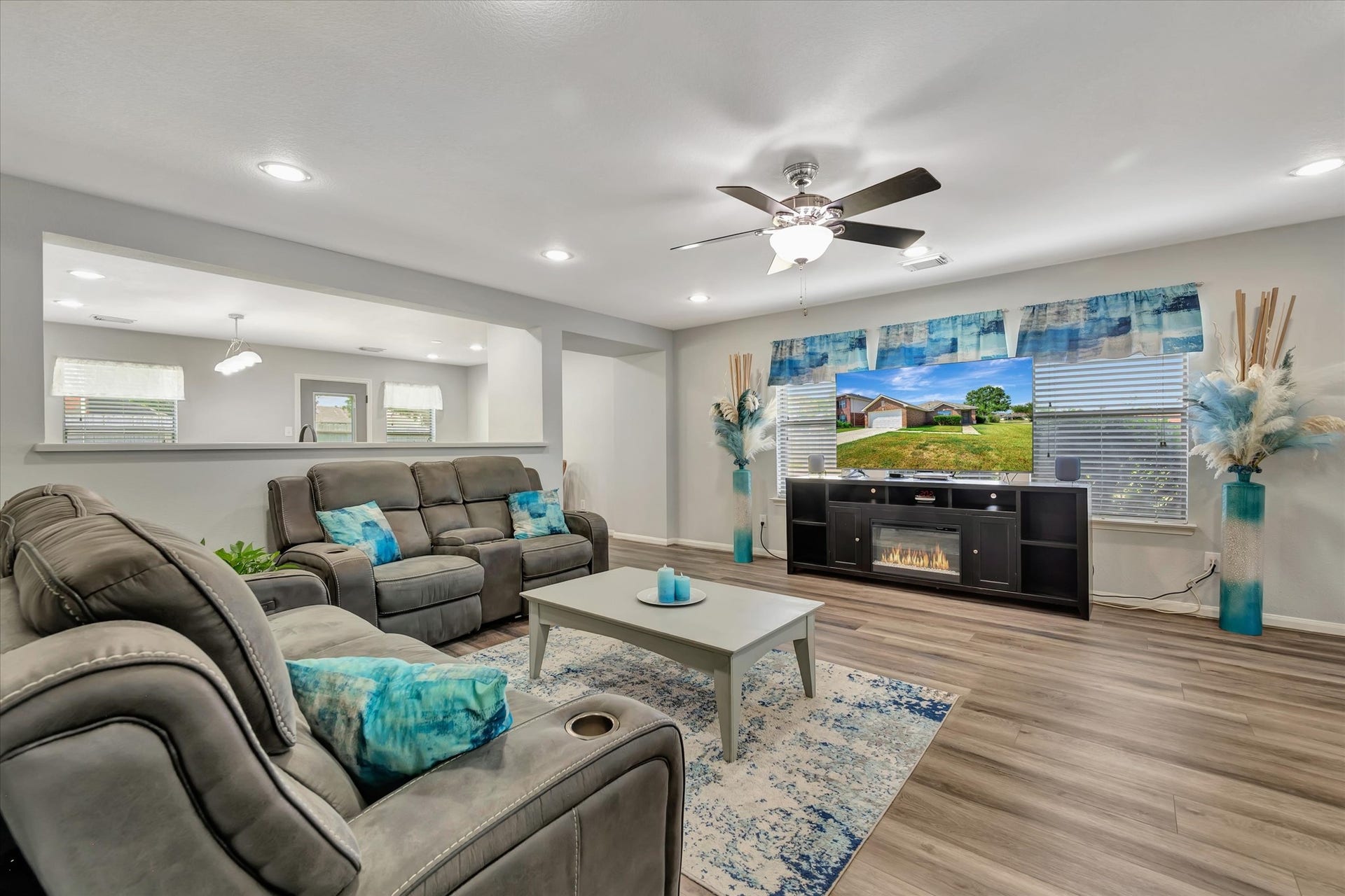 4802 Quiet Canyon Drive, Friendswood, TX 77546 Another half wall with a pass-through to the kitchen provides open sight lines from the front to the back!