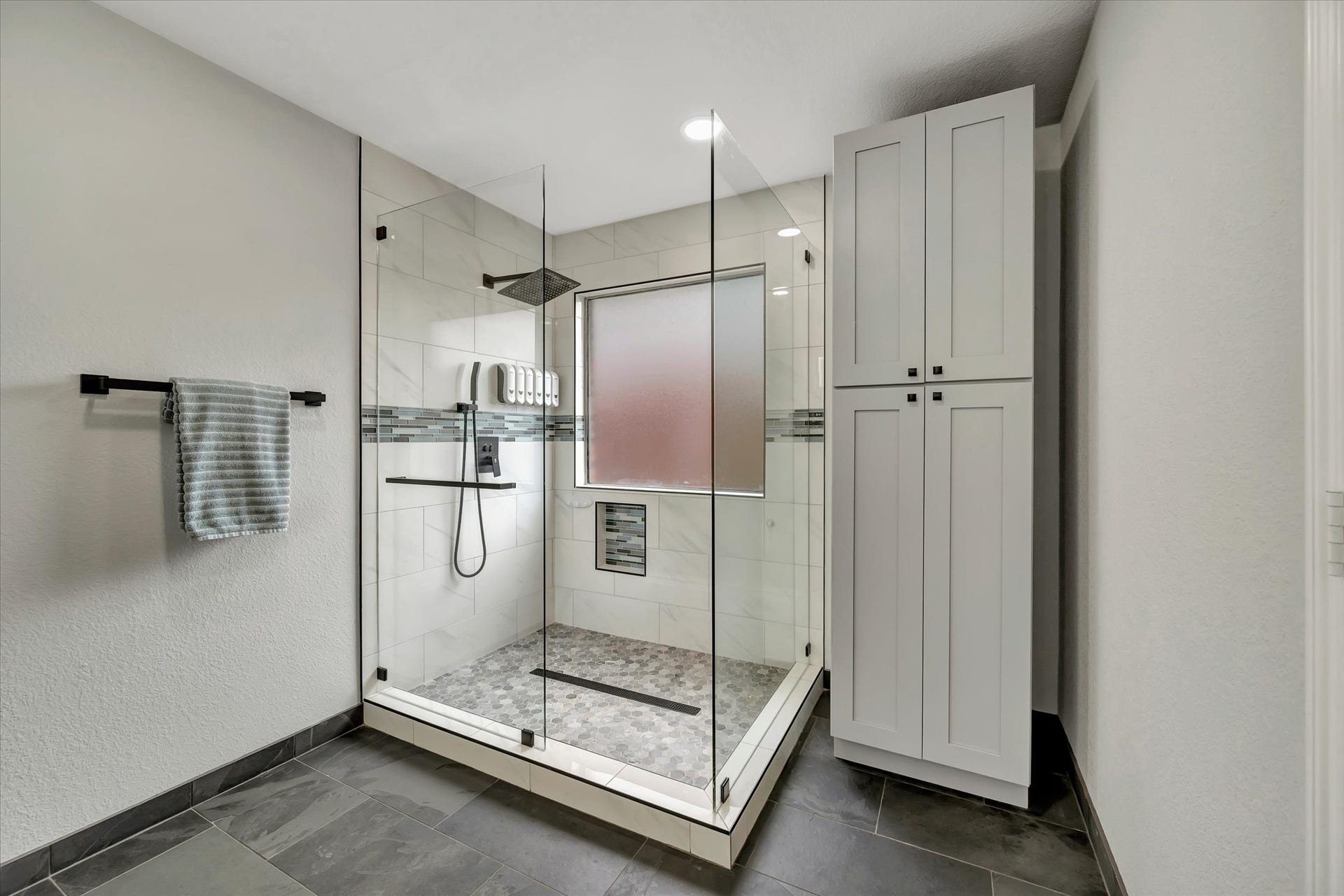 4802 Quiet Canyon Drive, Friendswood, TX 77546 An oversized walk-in shower is just shy of a spa experience at home!