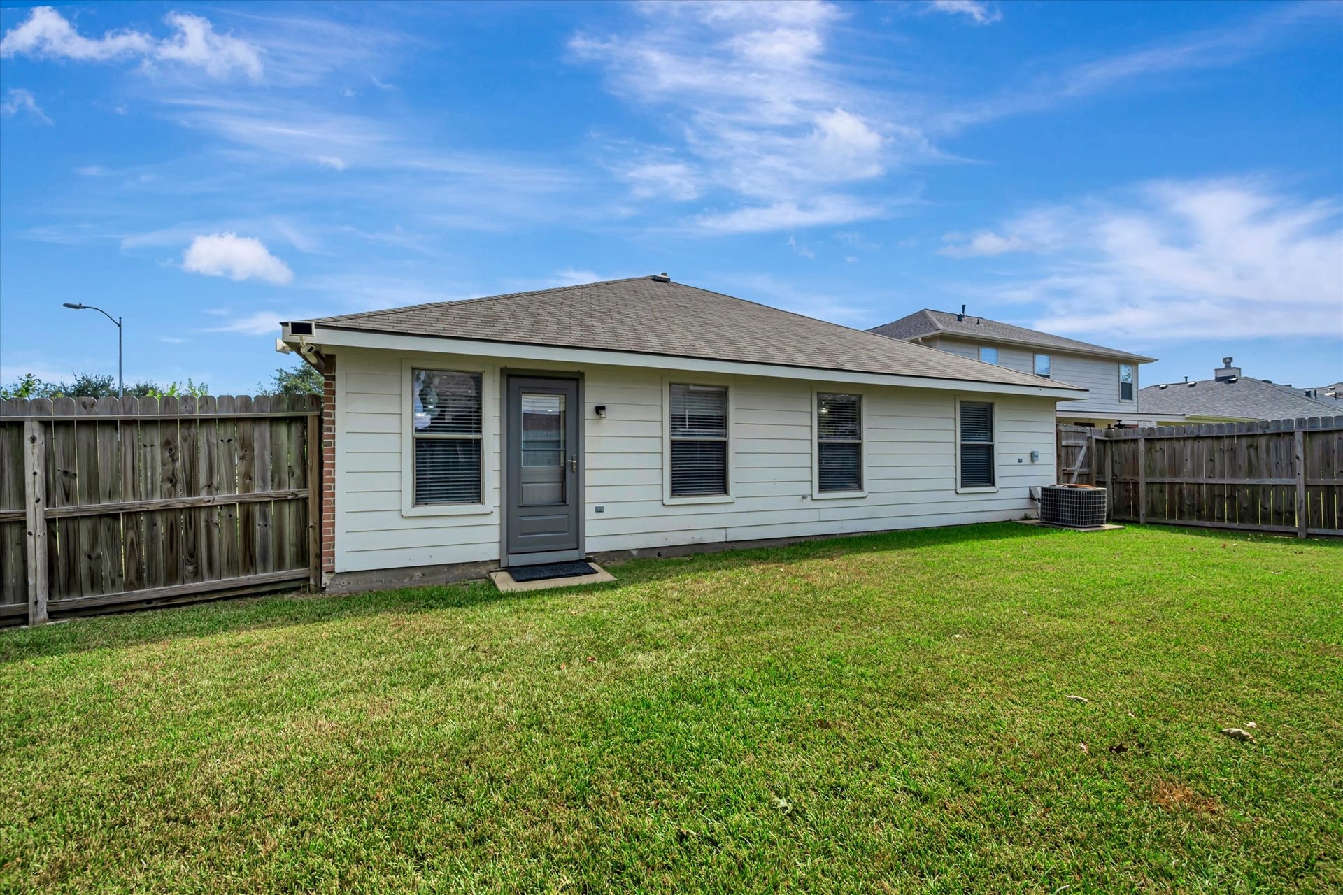 4802 Quiet Canyon Drive, Friendswood, TX 77546 Hardi siding and replaced back door.