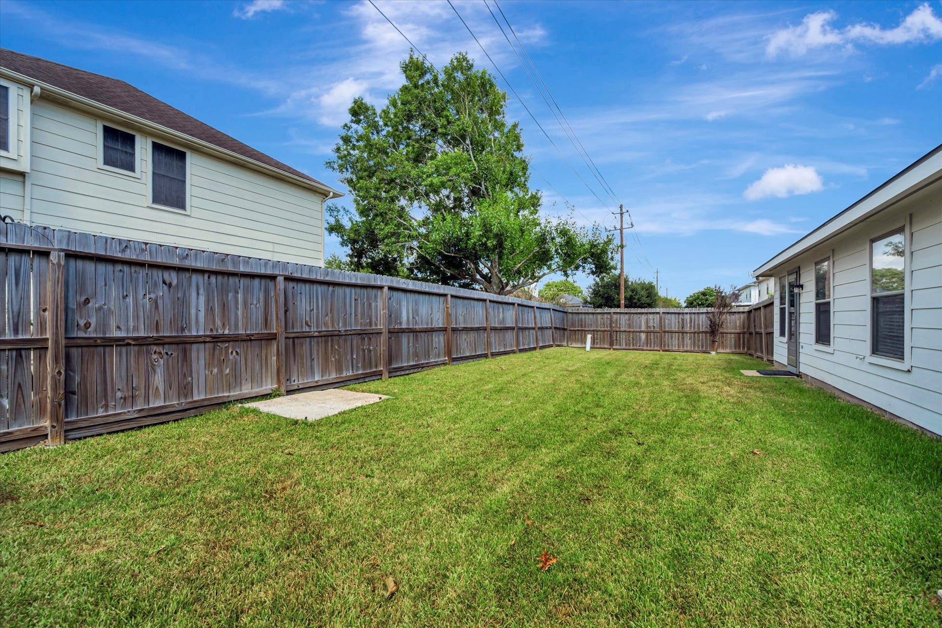 4802 Quiet Canyon Drive, Friendswood, TX 77546 Out back, there is plenty of room for kids and pets to safely play!