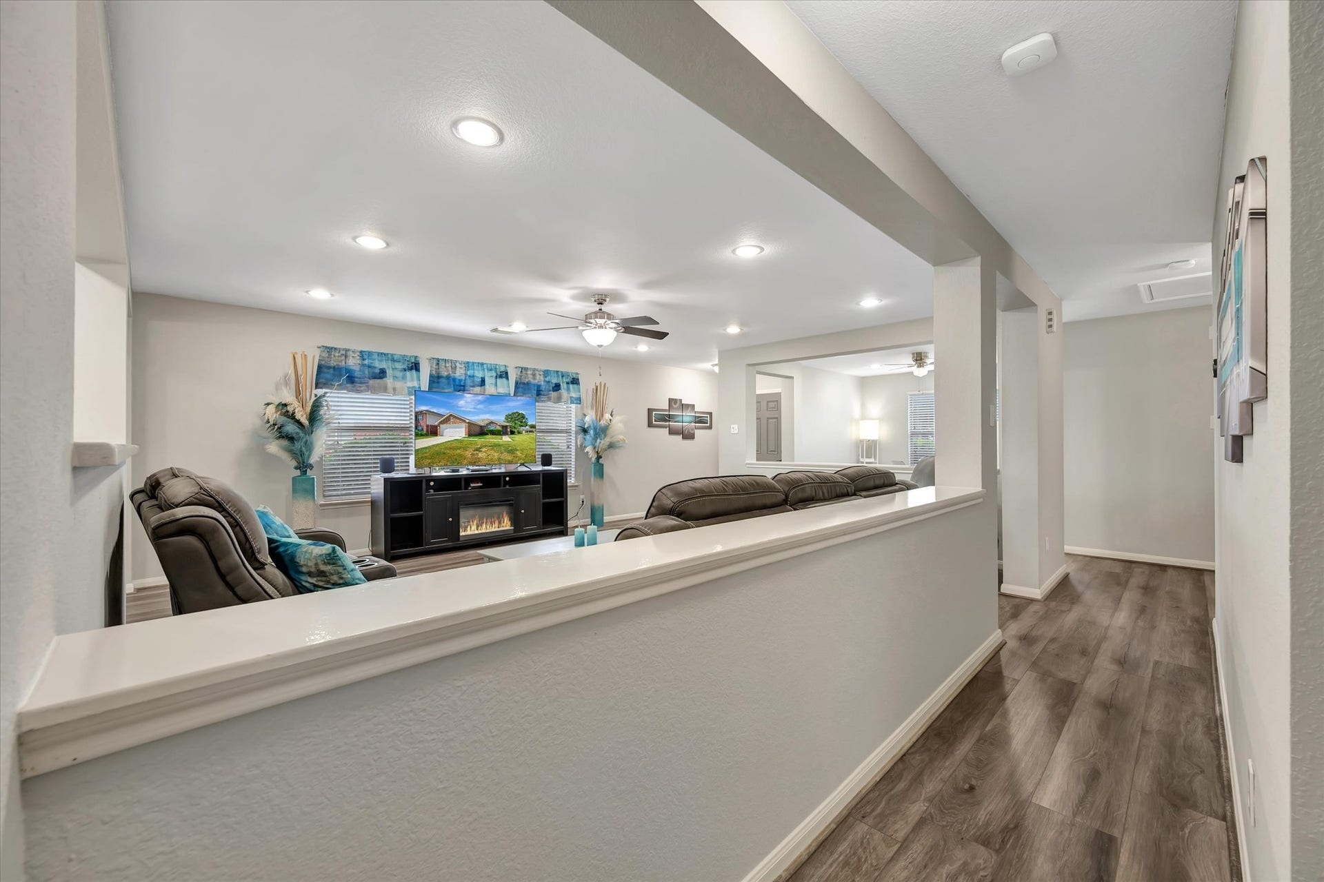 4802 Quiet Canyon Drive, Friendswood, TX 77546 Behind the living area is a hallway that leads to the bedrooms.