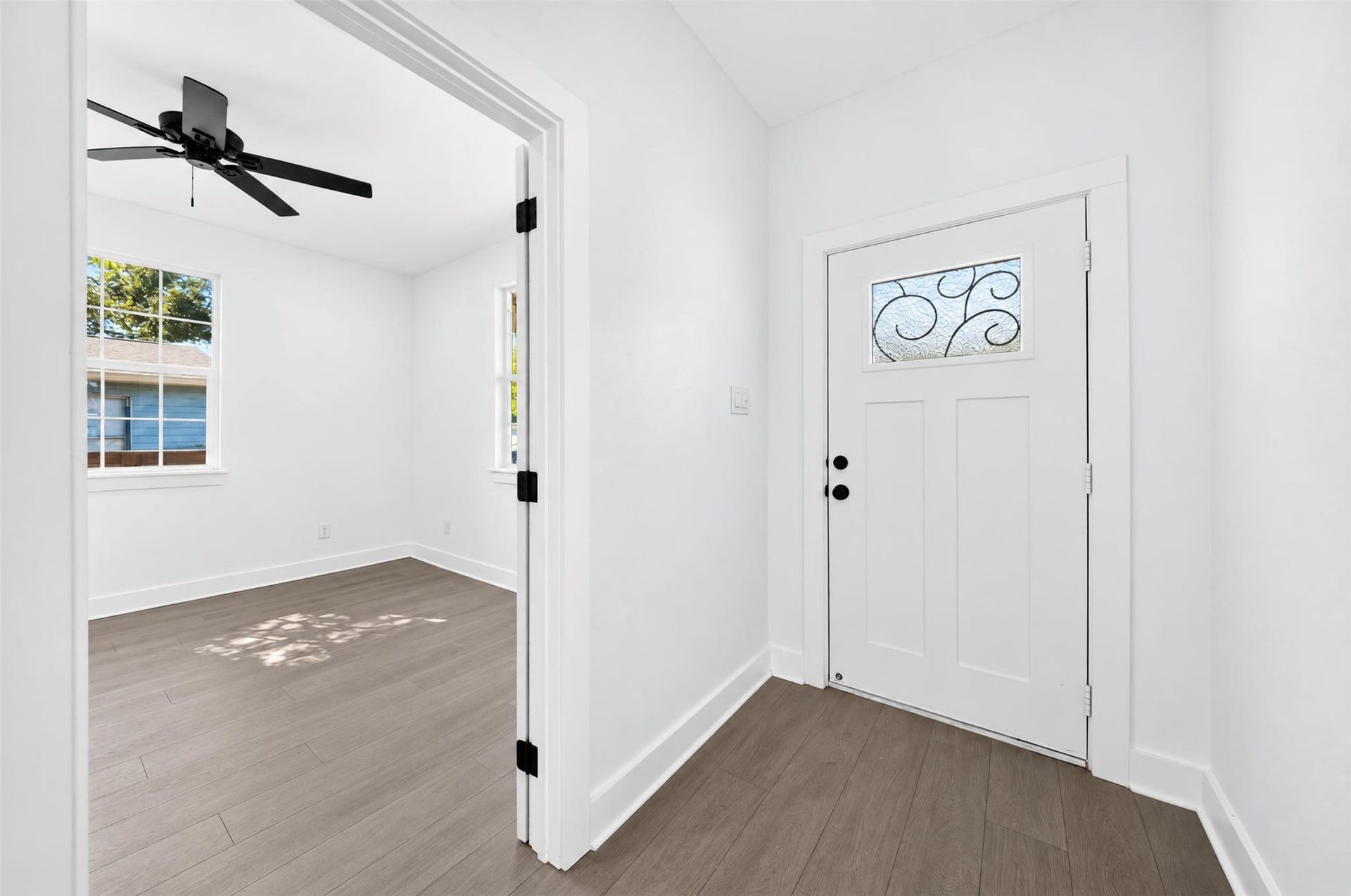 The entryway showcases entryway, complemented by light-colored walls and beautifully
flooring.