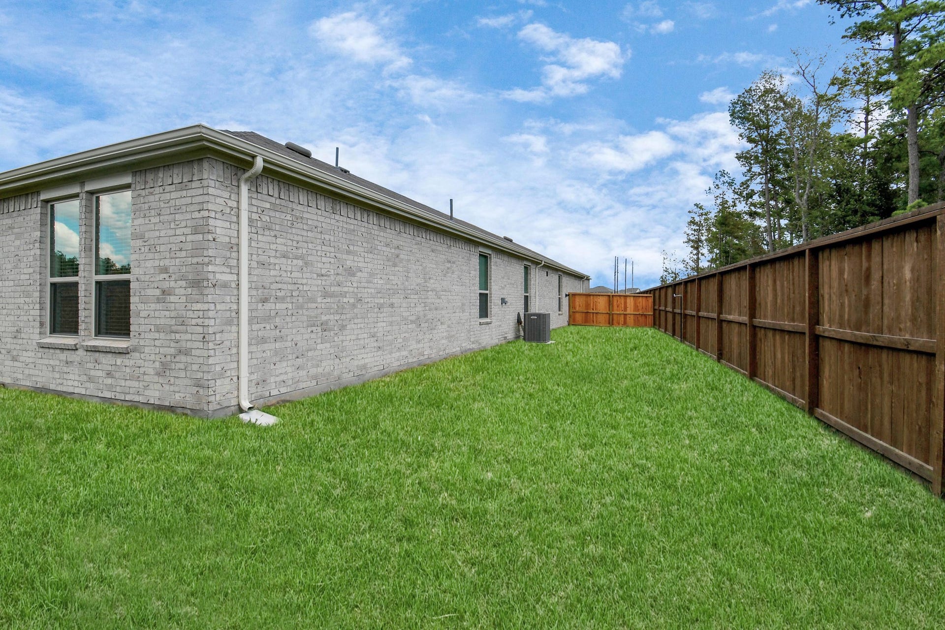 16150 Elbridge Court, Conroe, TX 77302 Plenty of room in the backyard for outdoor playing.
