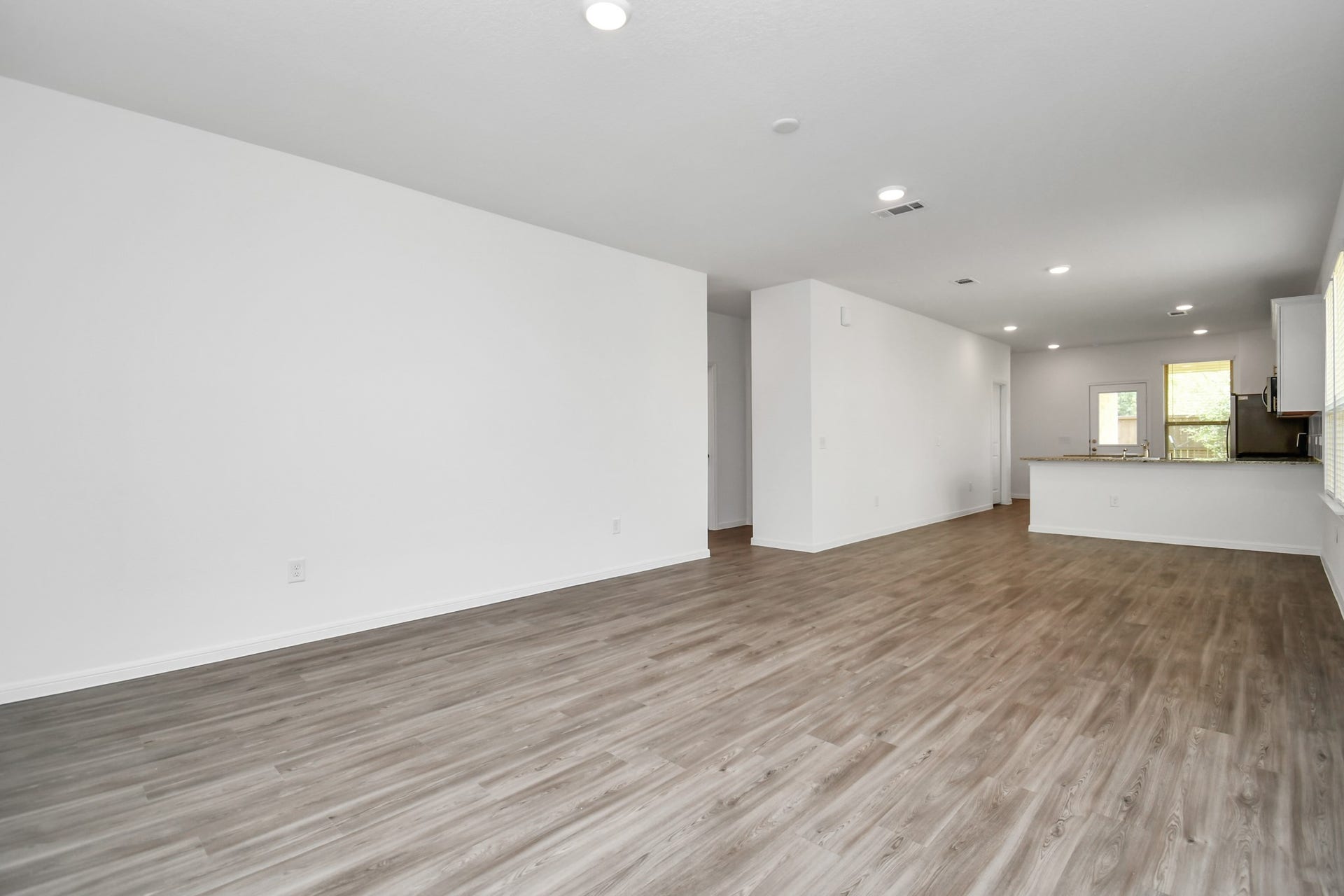 16150 Elbridge Court, Conroe, TX 77302 Another view of this amazing open floorplan with living/dinning area all in view of the kitchen.