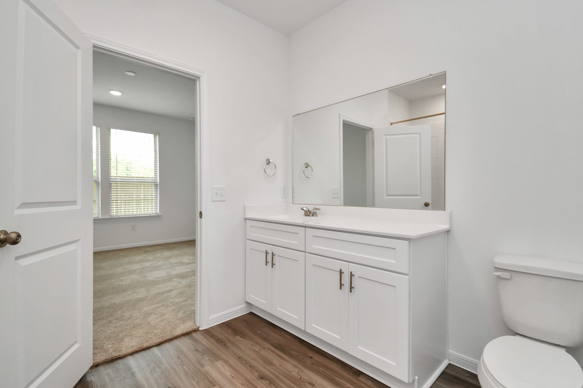 16150 Elbridge Court, Conroe, TX 77302 Master bathroom features a great vanity for enough room making it easy to get ready.