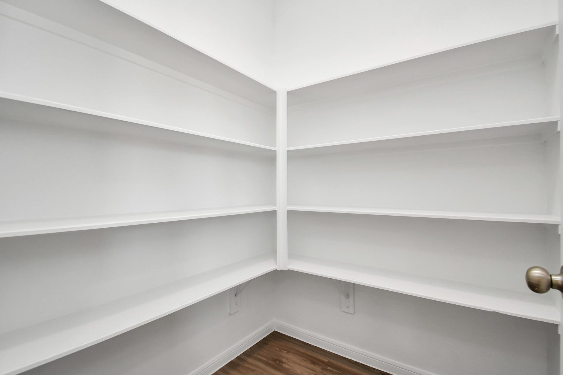 16150 Elbridge Court, Conroe, TX 77302 Large pantry with plenty of room for storage and located off the kitchen.