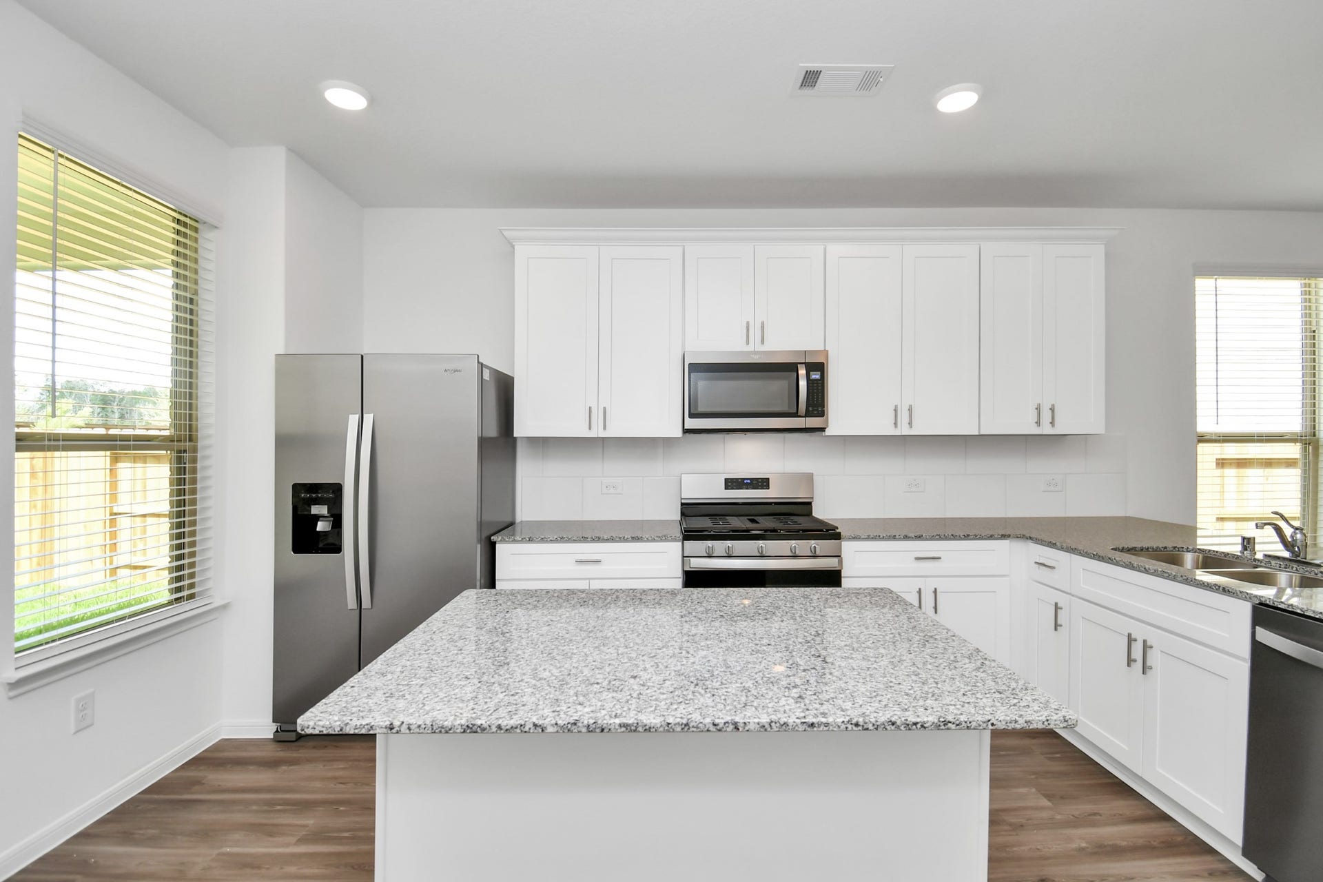 16150 Elbridge Court, Conroe, TX 77302 Kitchen featuring island and plenty of cabinet space.