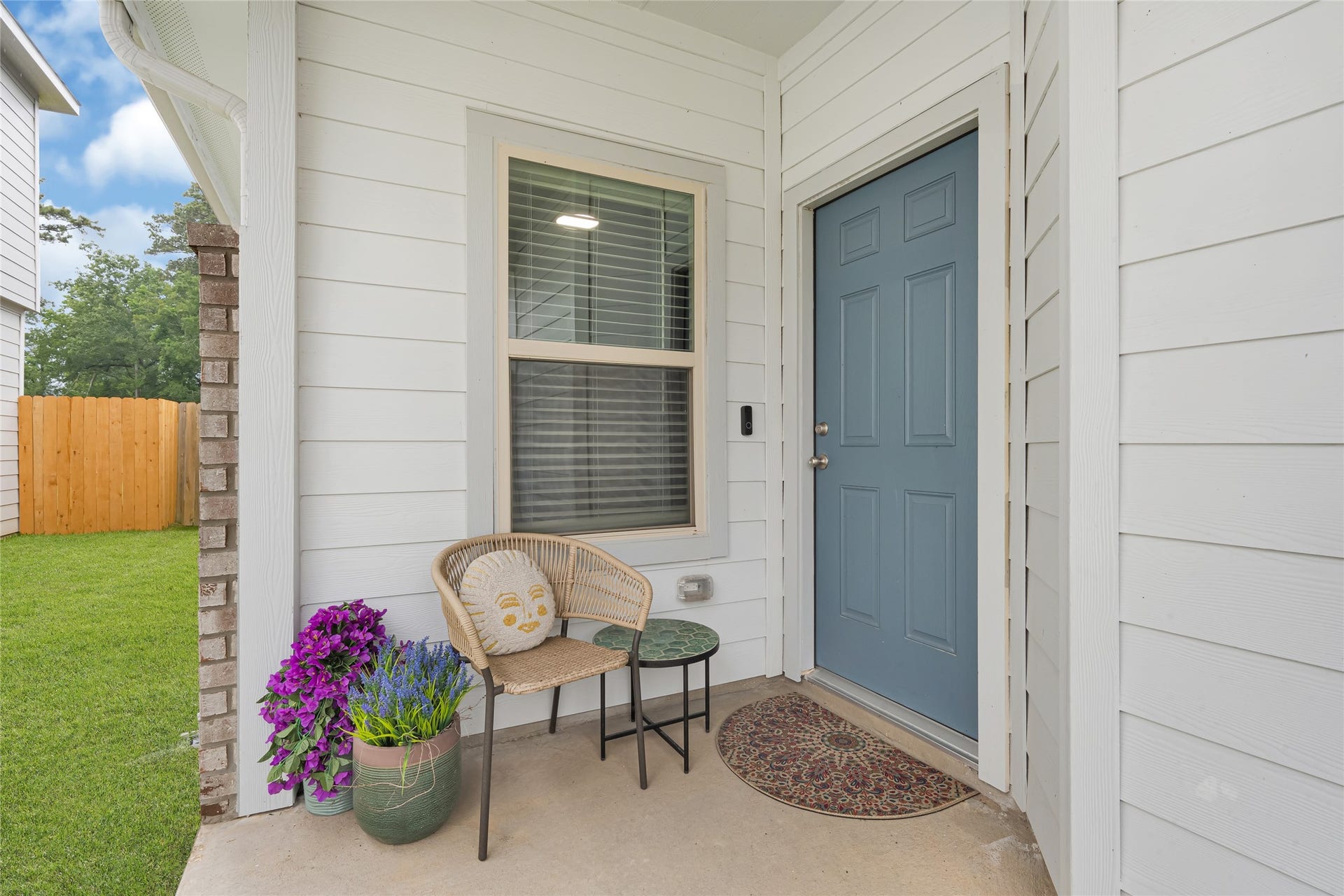 515 Emerald Thicket Lane, Houston, TX 77336 Step into charm with this inviting front porch featuring a stylish blue door and sleek satin nickel hardware, this home is complemented by the convenience of two hose bibs.