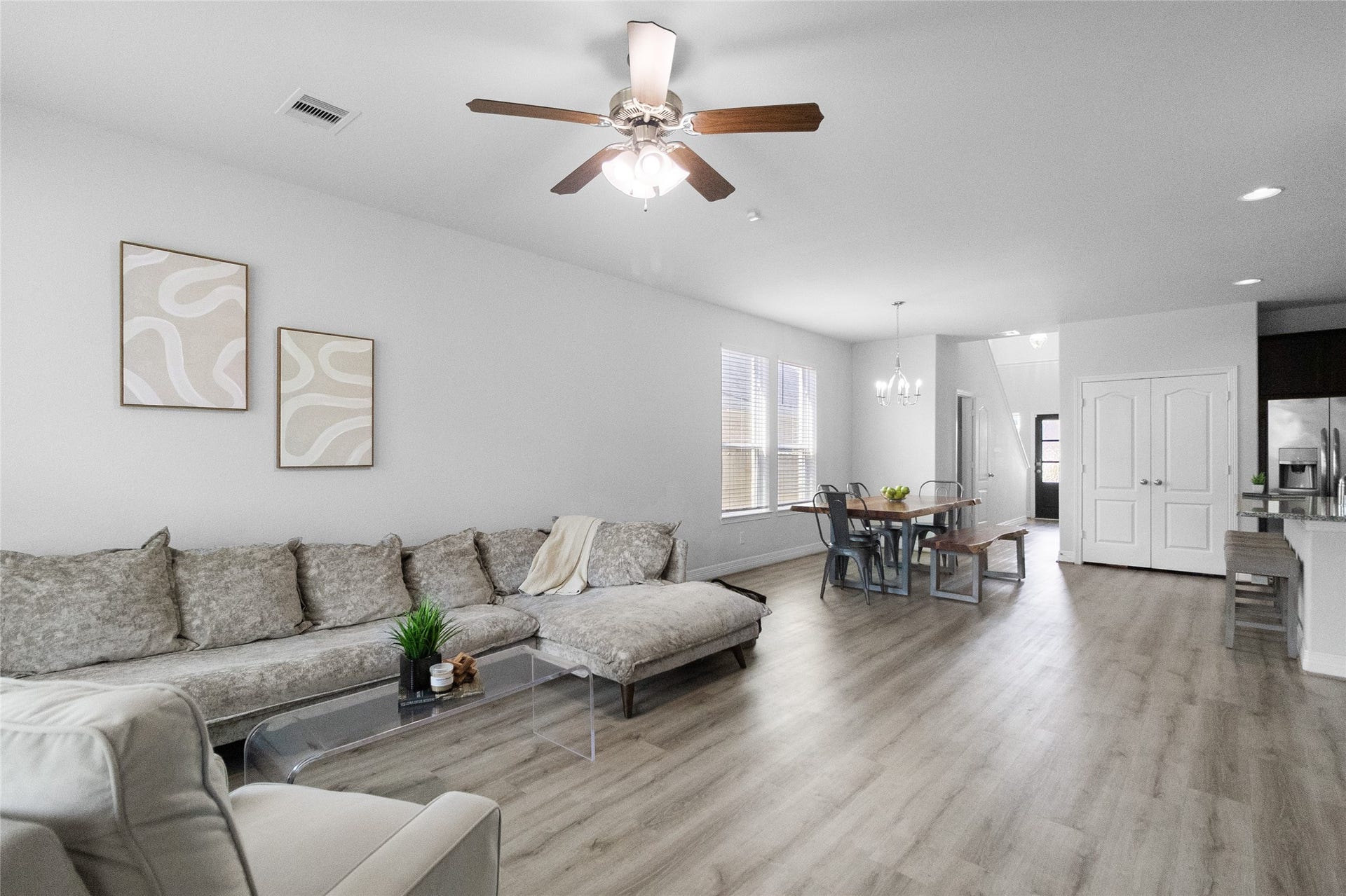 Stretch out and relax in your spacious living room, where the open layout gives everyone room to gather comfortably.