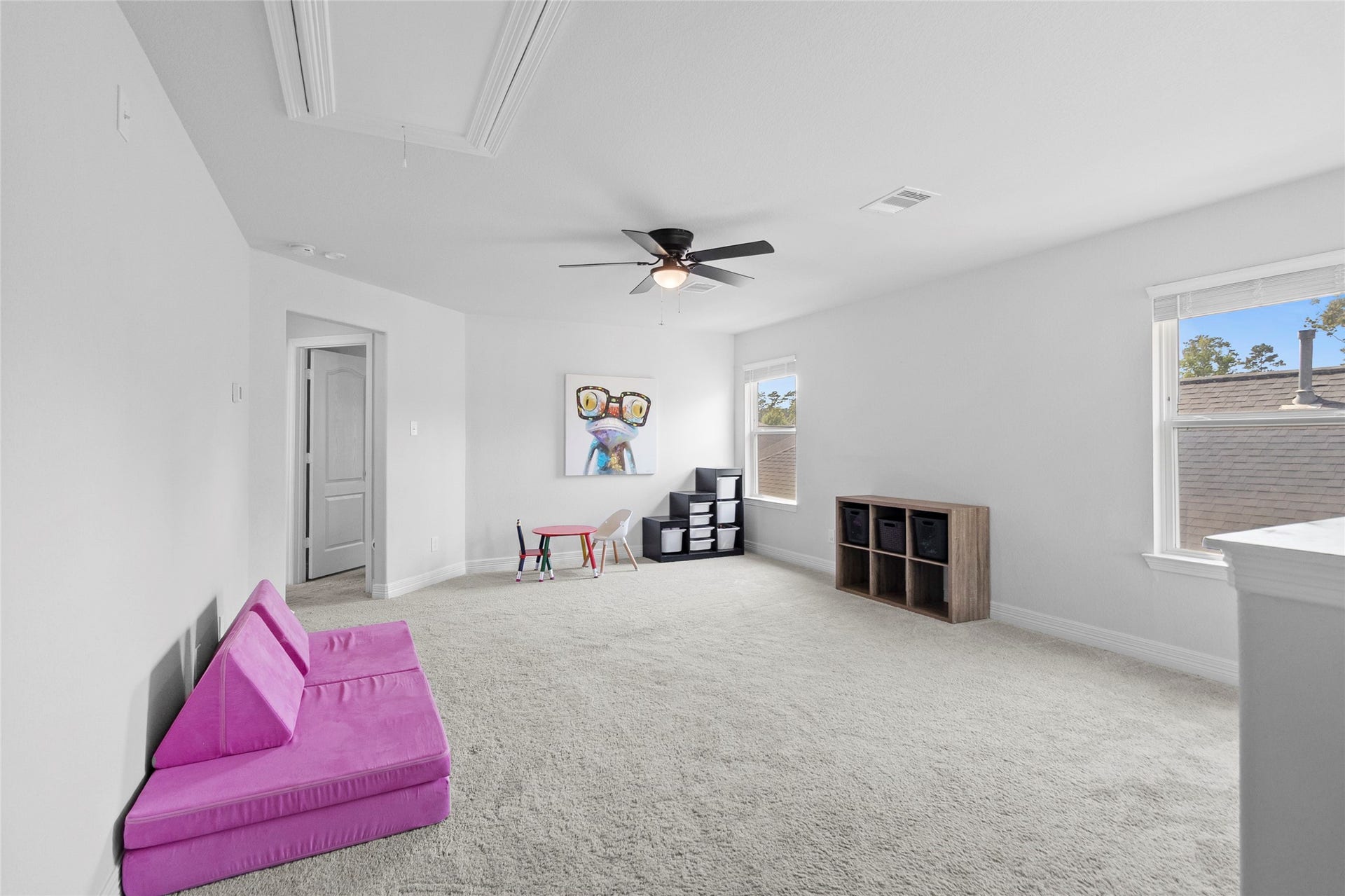 Upstairs, this oversized flex room/loft gives you the freedom to create a media lounge, game room, play space, or all three.