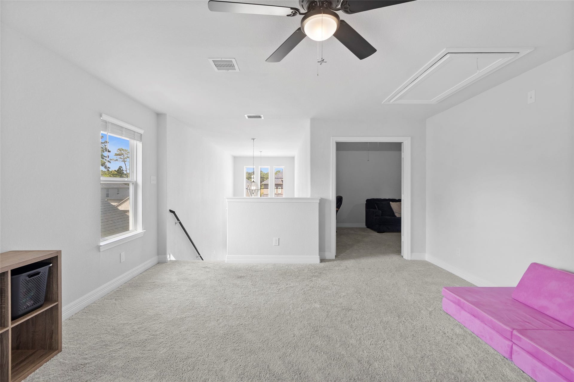 Theres room for everyone to spread out in this versatile upstairs retreat, making movie nights and laid-back weekends feel right at home.
