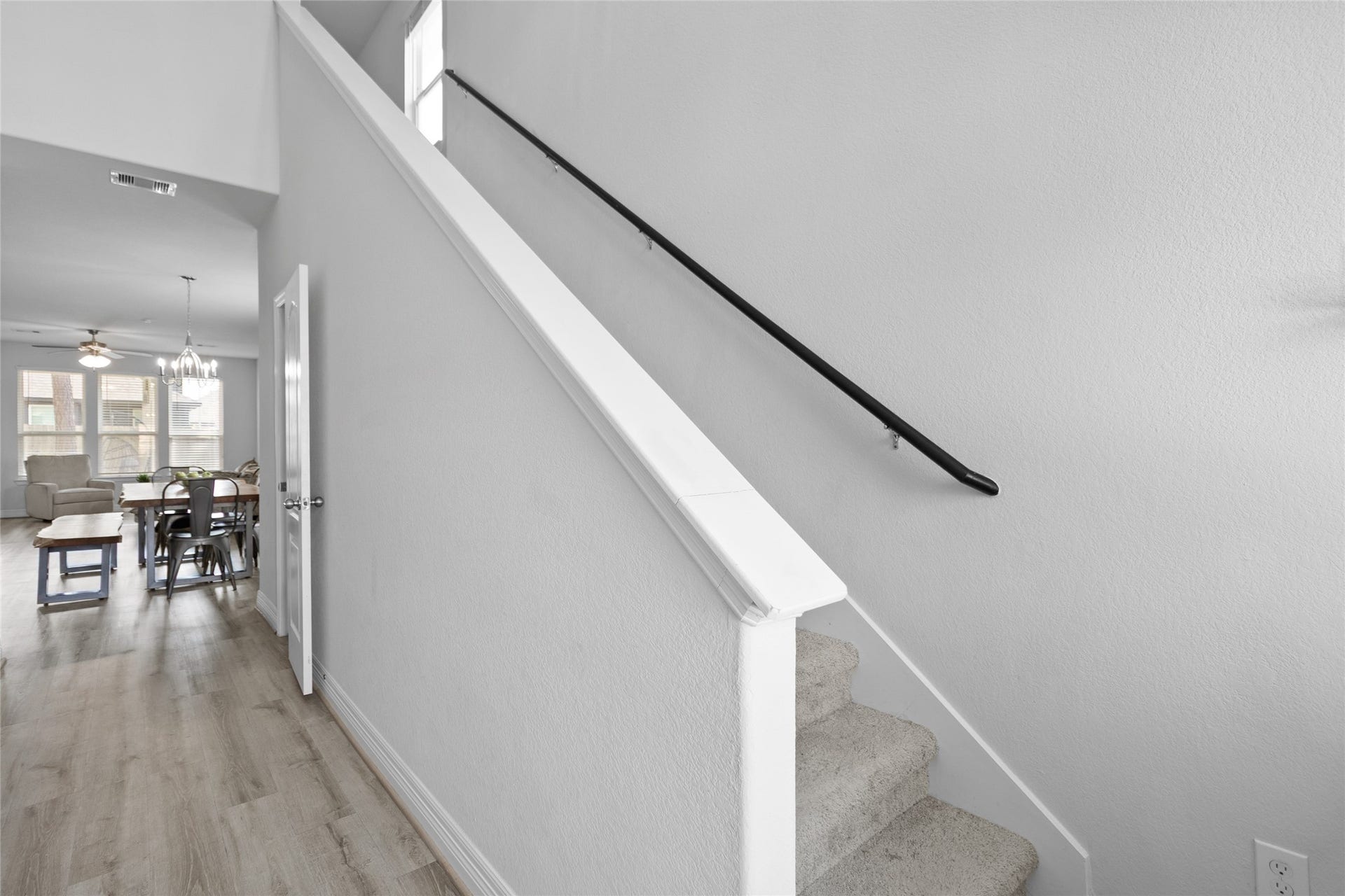 Moving between floors feels open and connected, with your staircase flowing right into the main living areas below.
