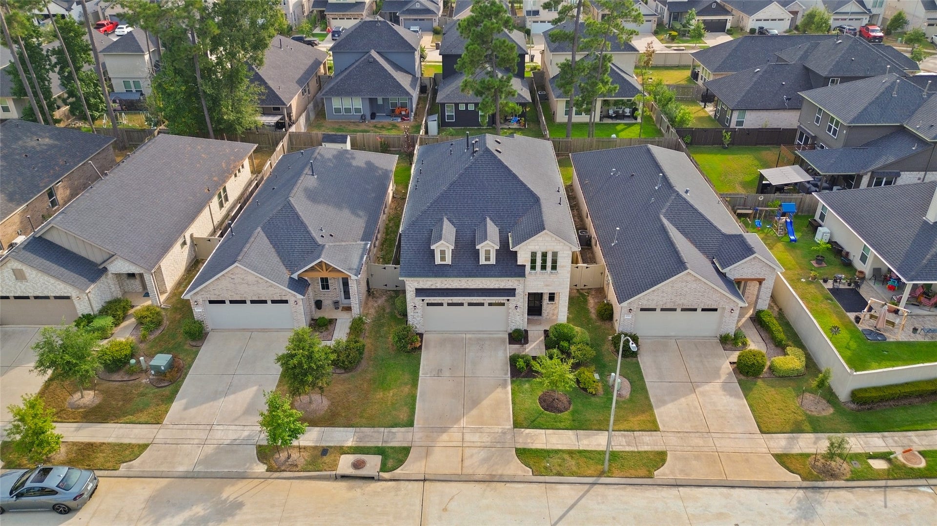 From above, you can see how your home sits comfortably within the neighborhood, with sidewalks, green spaces, and a welcoming residential setting all around.