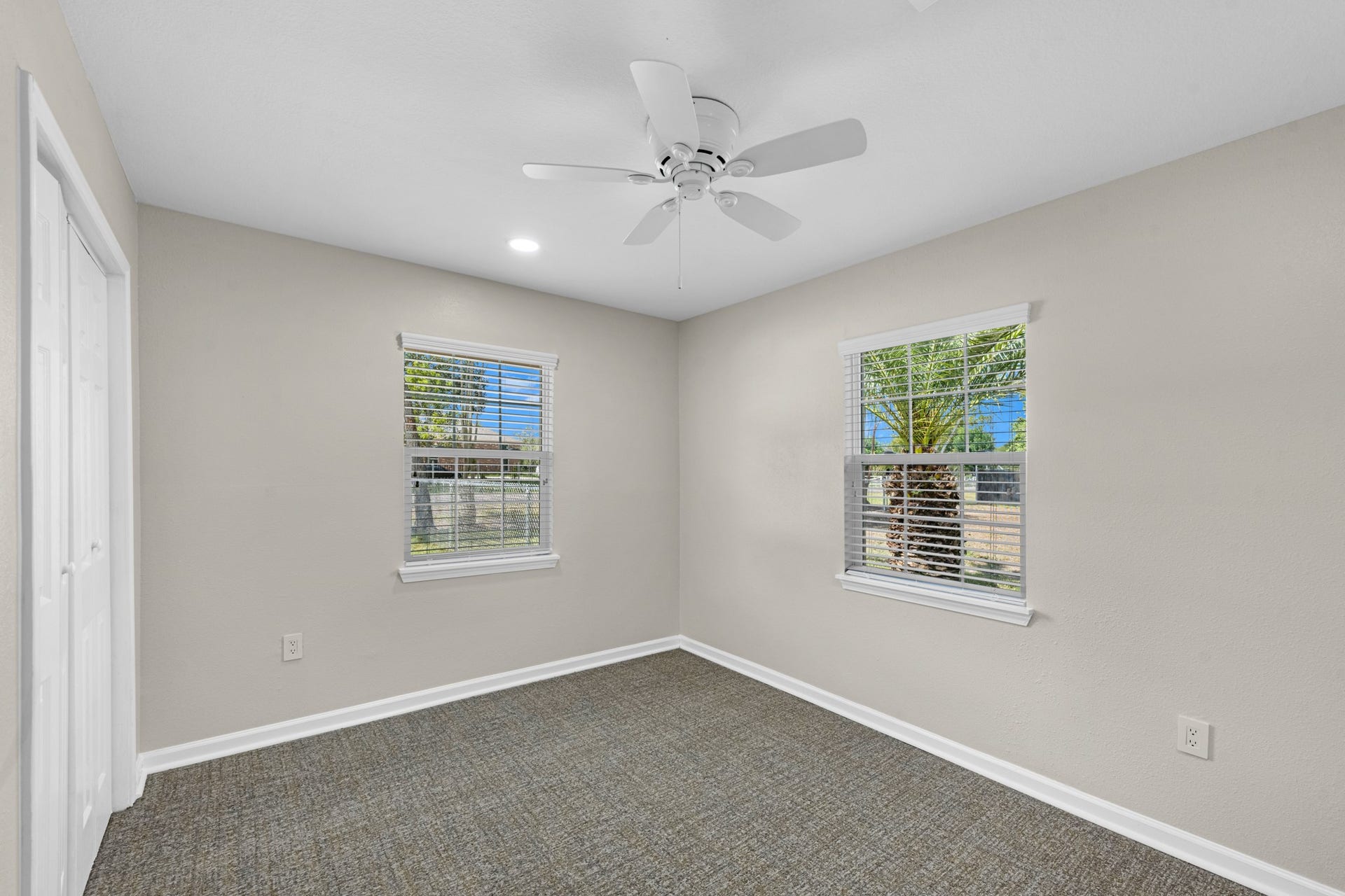 17435 Wells Drive, #CR115, Pearland, TX 77584 Moving on, the next bedroom features two windows for natural light.