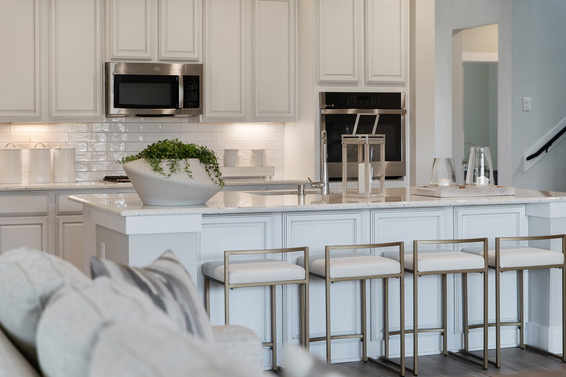 22122 Cortona Creek Lane, Hockley, TX 77447 The extended counter area adds both practicality and style, making meal preparation a breeze. Every detail is thoughtfully designed to enhance the kitchen's functionality and aesthetic appeal.