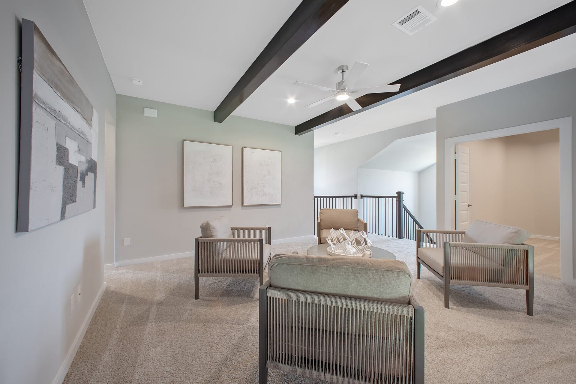 22122 Cortona Creek Lane, Hockley, TX 77447 Come upstairs and relish a day of relaxation in this loft area! Ideal as an additional living space or game room, it boasts plush carpeting, high ceilings, custom paint, and windows that flood the area with abundant natural light.