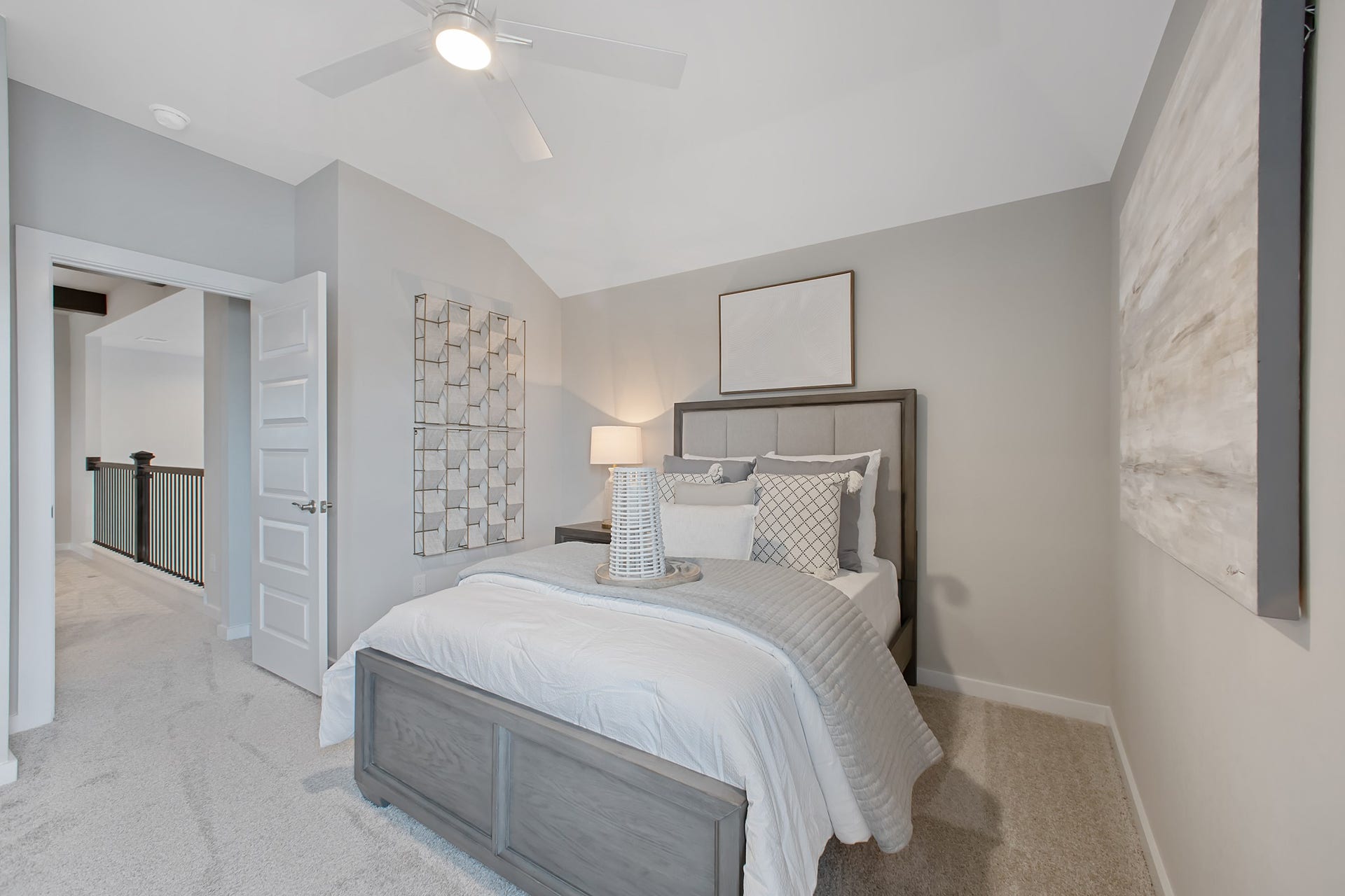 22122 Cortona Creek Lane, Hockley, TX 77447 Generously sized secondary bedrooms featuring spacious closets, soft and inviting carpeting underfoot, large windows allowing plenty of natural light, and the added touch of privacy blinds for your personal retreat.