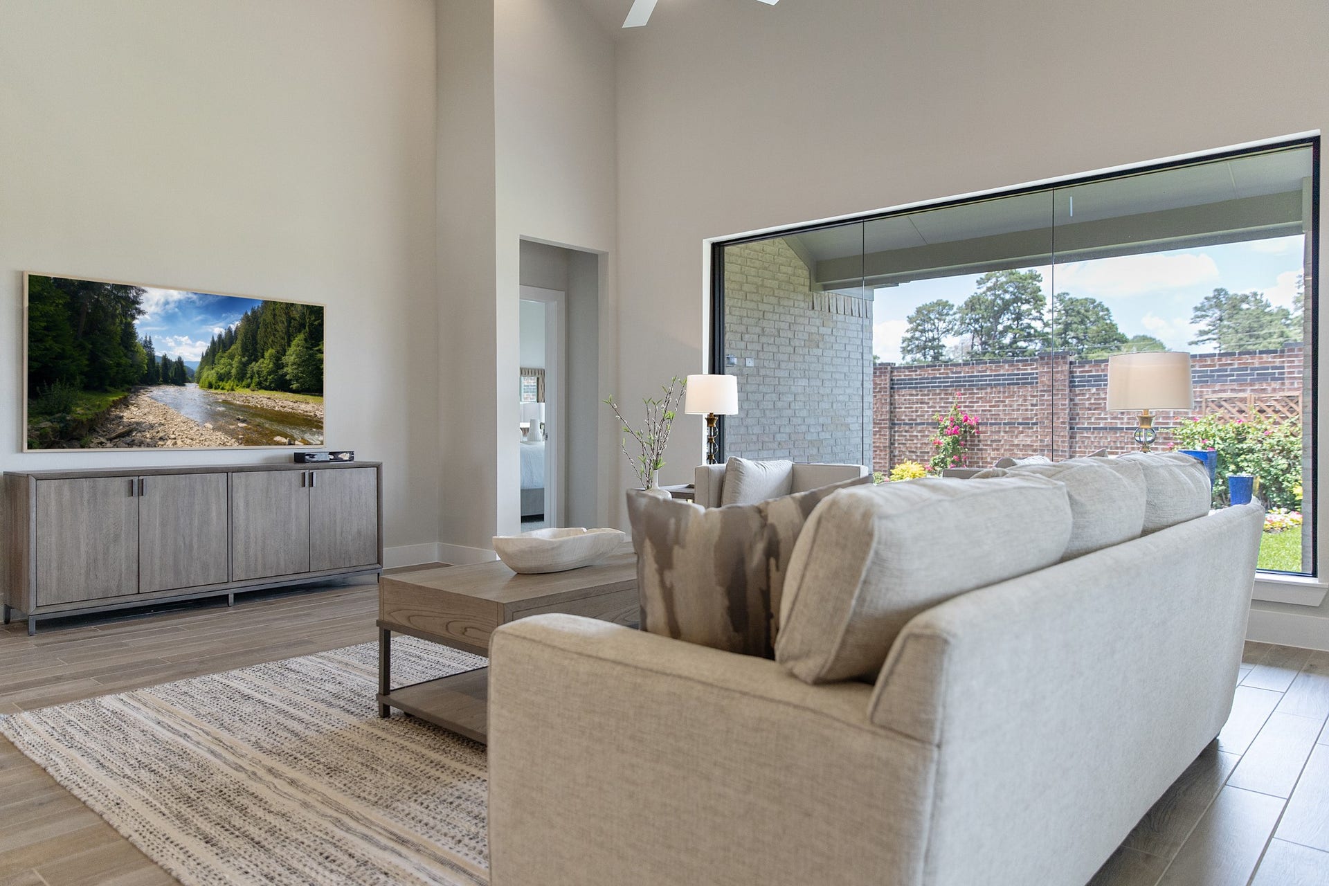 22122 Cortona Creek Lane, Hockley, TX 77447 Take another glimpse into the heart of the home with this additional view of the family rooma sprawling space ready to accommodate all your gatherings.