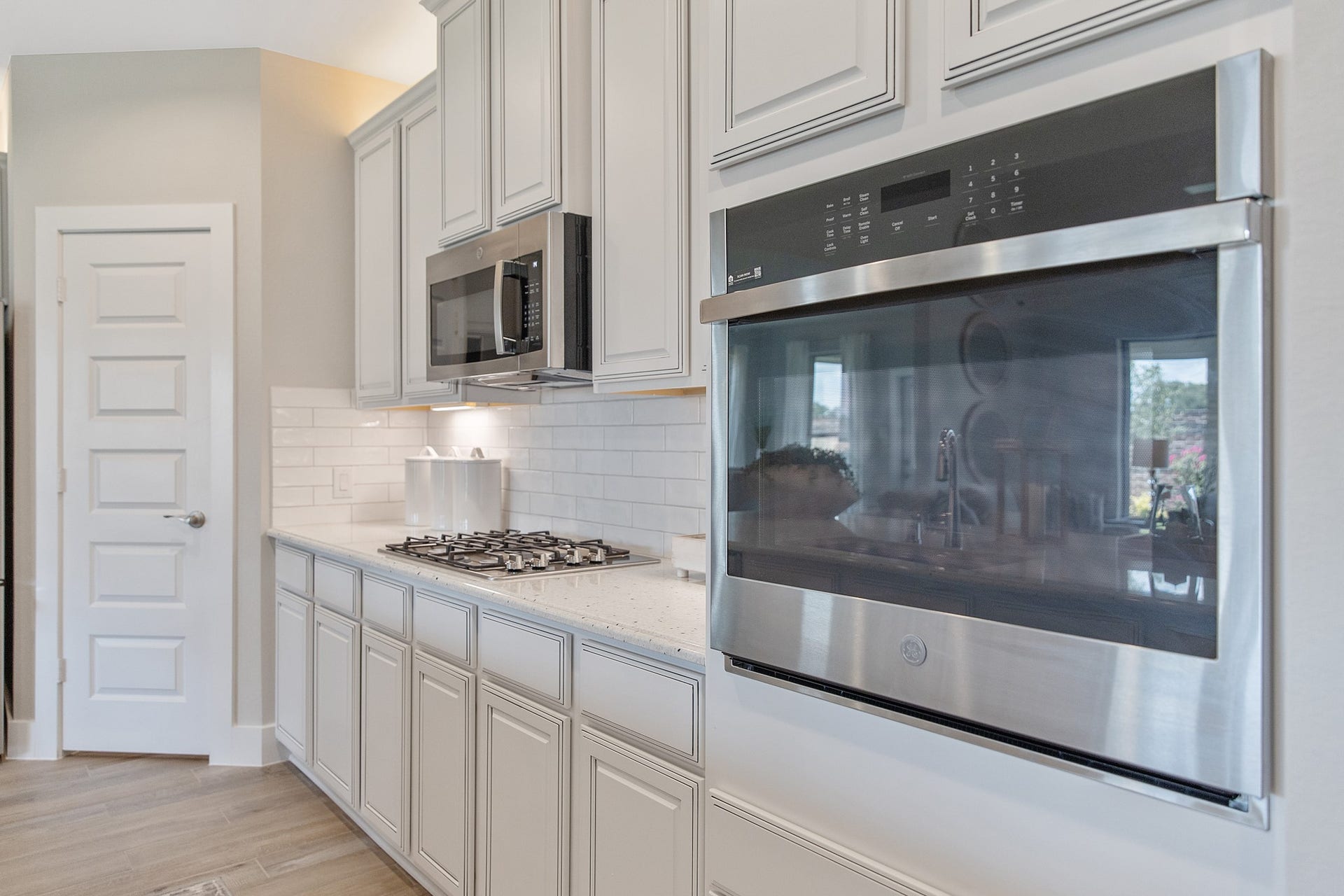 22122 Cortona Creek Lane, Hockley, TX 77447 The open concept effortlessly connects the kitchen to the expansive family room, forming a perfect hub for gatherings. This seamless flow creates an inviting space where cooking and socializing come together harmoniously.