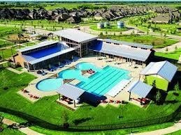2418 Green Kale Drive, Richmond, TX 77406 Dive into the Harvest Green lifestyle! Residents enjoy resort-style pools, perfect for cooling off and making memories all summer long.