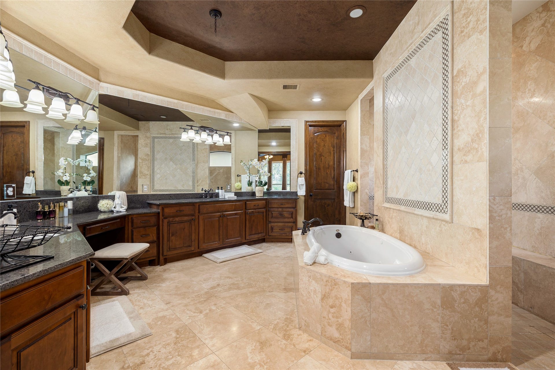 27711 Charter Lake Lane, Katy, TX 77494 Spa-inspired bath with oversized shower, soaking tub, dual vanities, and generous walk-in closet.