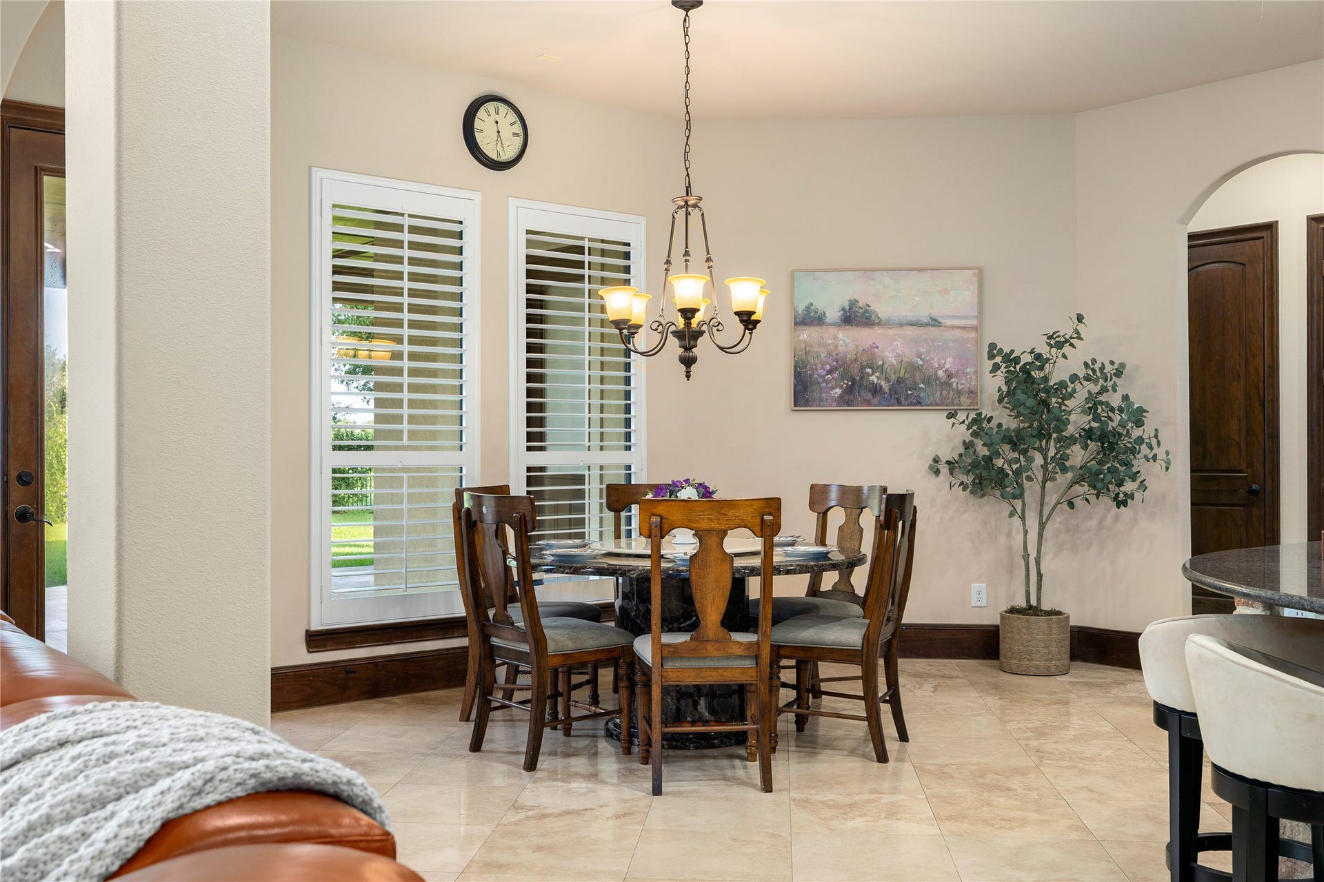27711 Charter Lake Lane, Katy, TX 77494 Light-filled breakfast room offering serene views of the backyard and lake.