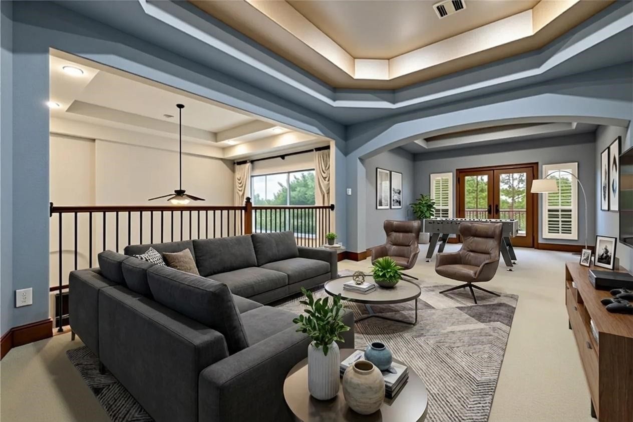 [Virtually staged] Large upstairs game room offering flexible space for entertainment and recreation.