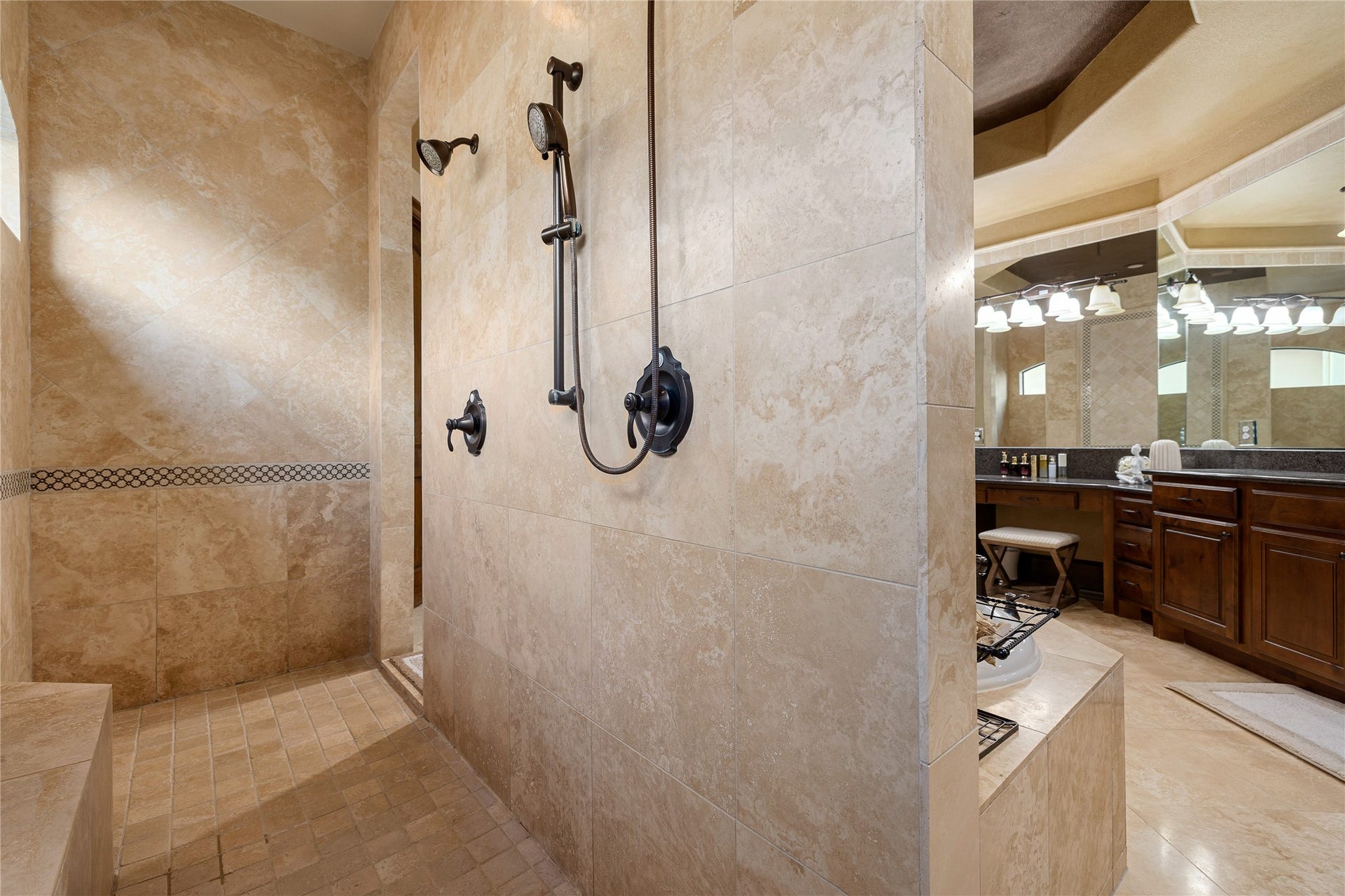 27711 Charter Lake Lane, Katy, TX 77494 Spa-inspired bath with oversized shower, soaking tub, dual vanities, and generous walk-in closet.
