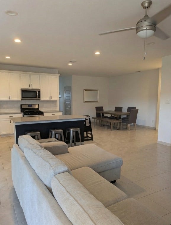 28919 Yachting Point Lane, Katy, TX 77494 ceiling fan at the living room