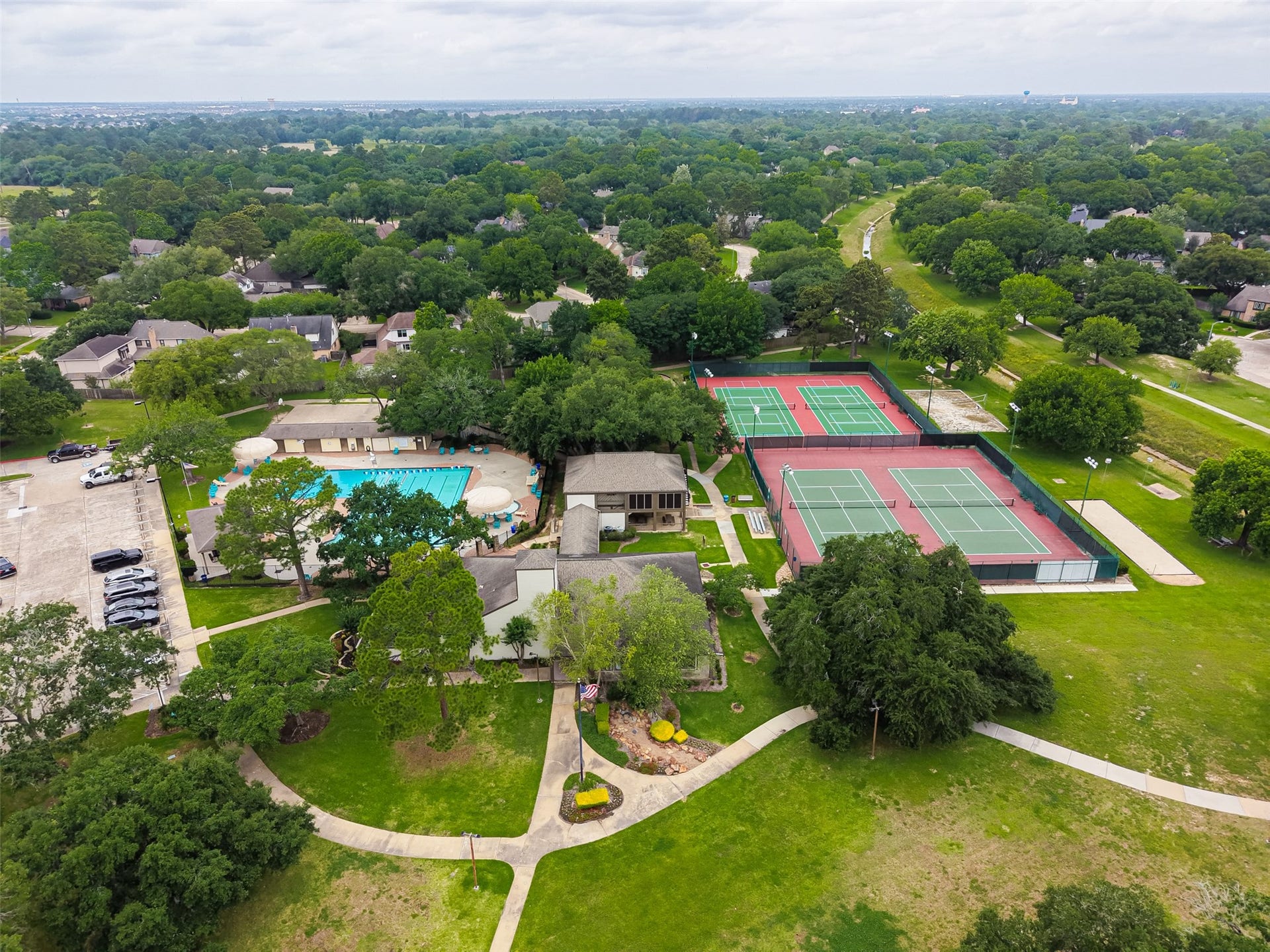 The Deerfield Village Community has tennis courts, pickleball courts, Bocce Ball, a basketball court, volleyball court, two club houses, an Olympic sized pool, two playgrounds, baseball field, and an appx two mile walking trail! There's even clubs you can join for any and all age groups!