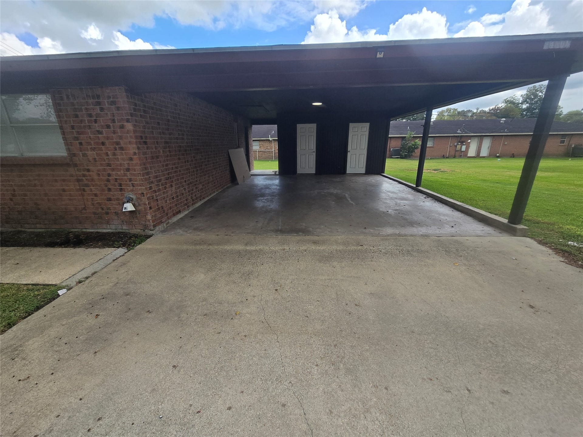 3453 W Highway 6, #1, Alvin, TX 77511 covered carport and built in storage area