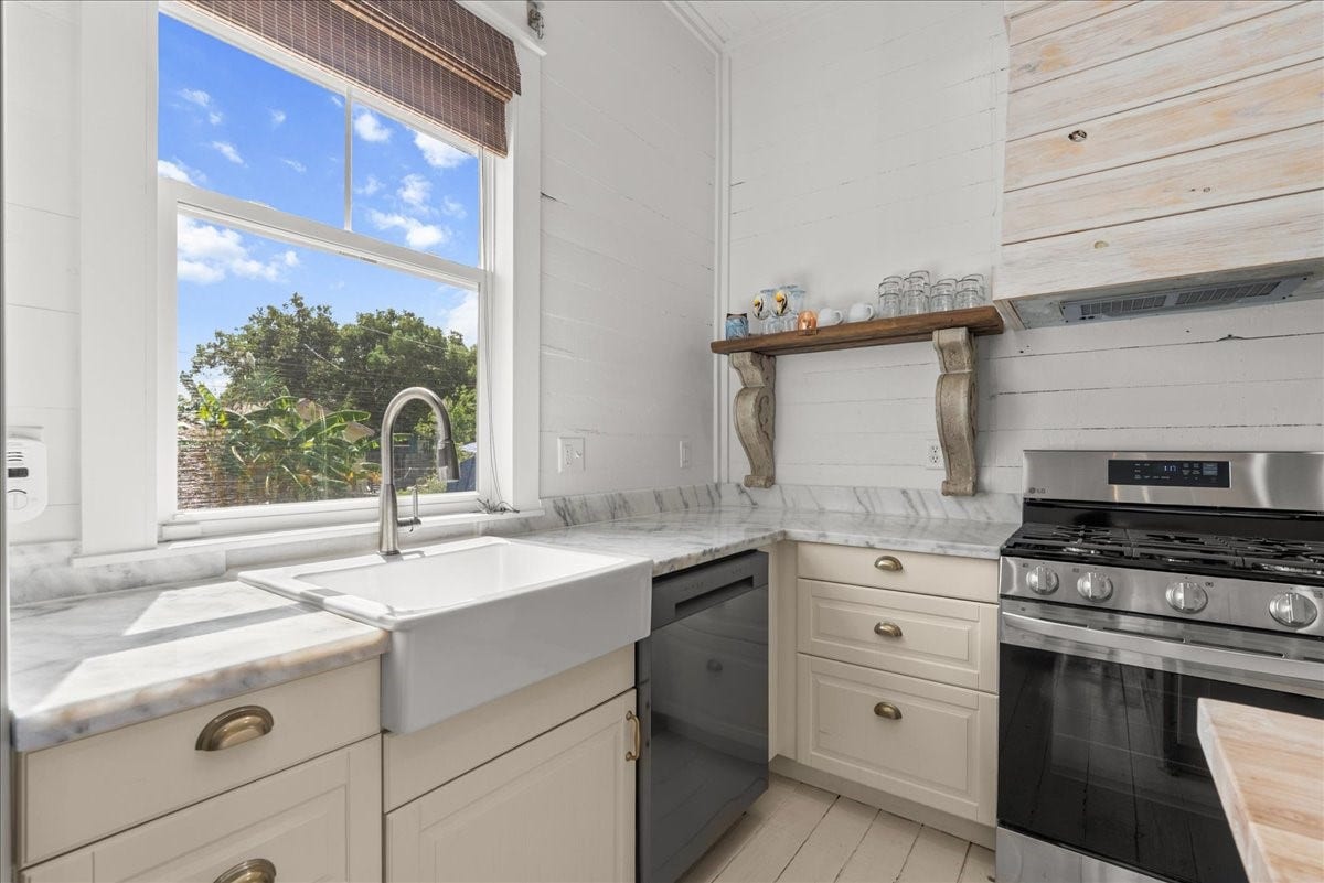 4201 Avenue R, Galveston, TX 77550 Bright kitchen workspace with window over the sink.