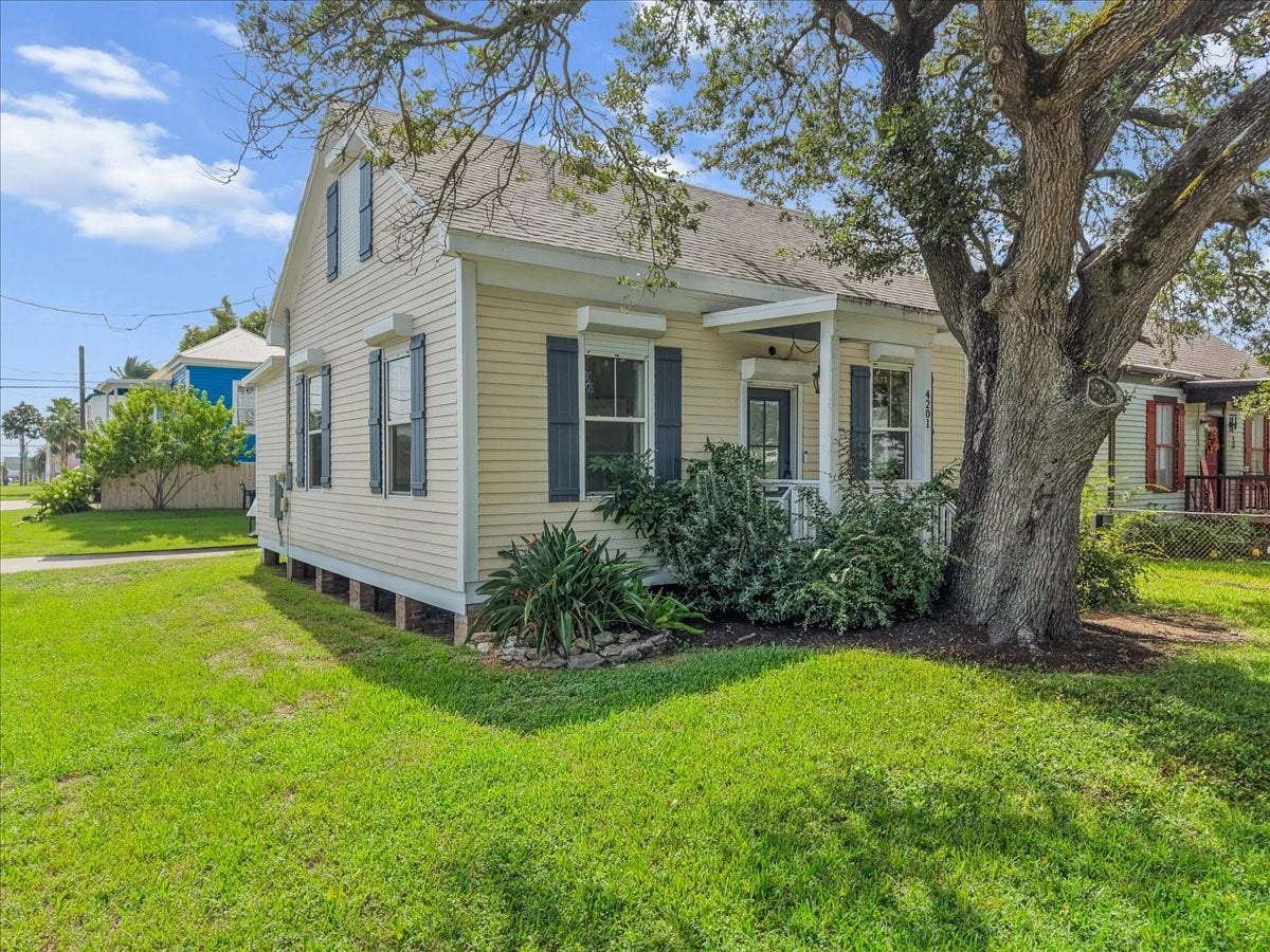 4201 Avenue R, Galveston, TX 77550 Another view of the front elevation and spacious yard.