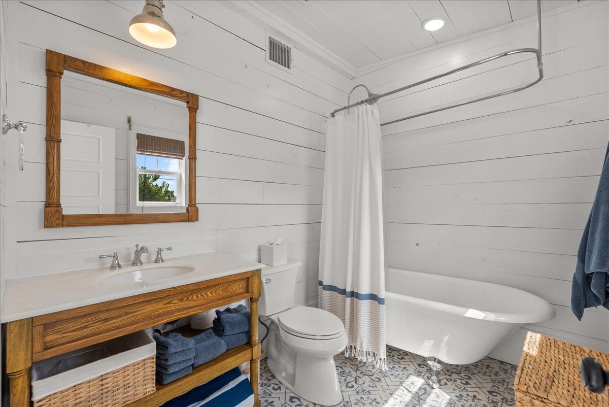 4201 Avenue R, Galveston, TX 77550 Bathroom with classic finishes and functional layout.