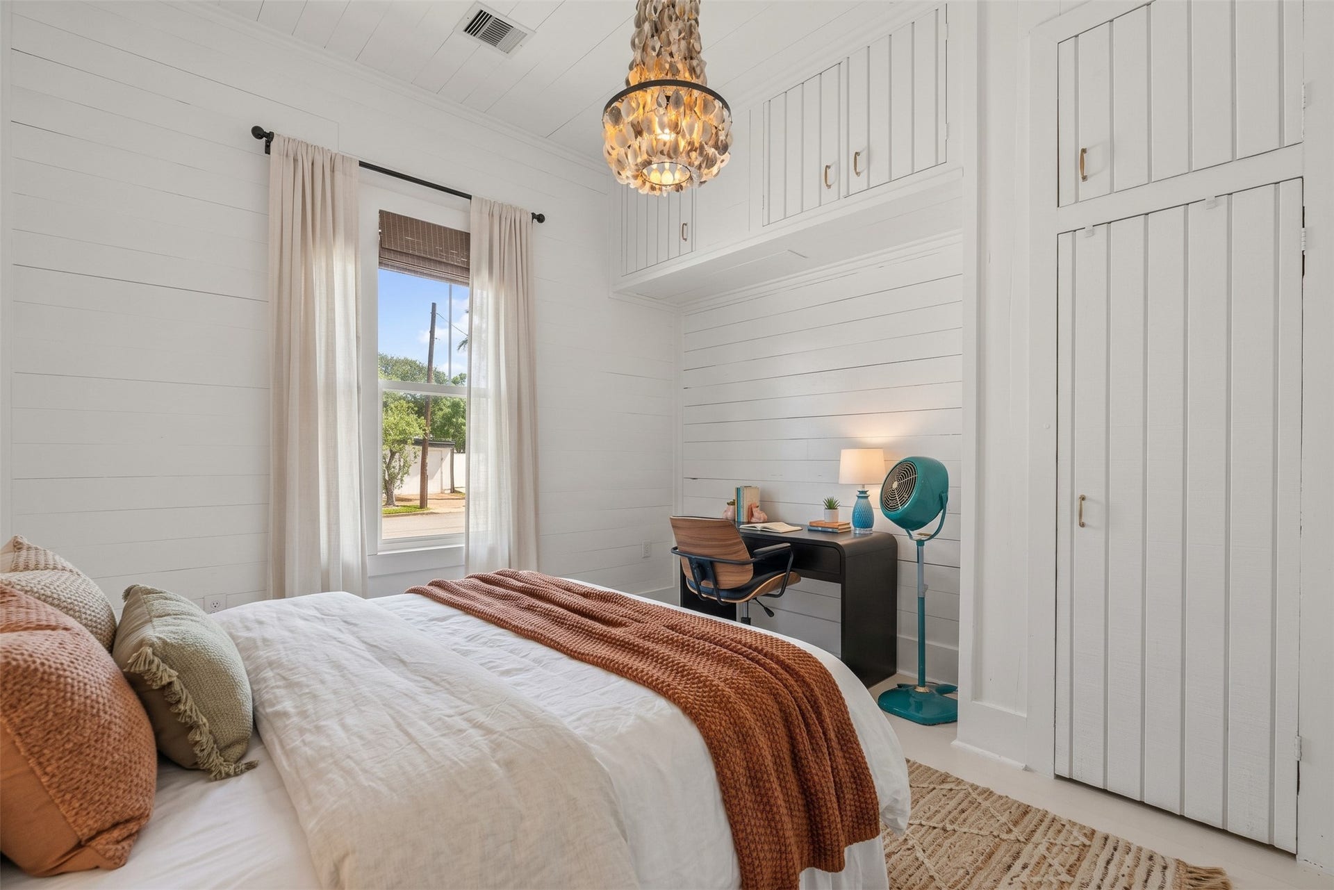 4201 Avenue R, Galveston, TX 77550 Bedroom with built-in storage and a cozy, inviting feel.