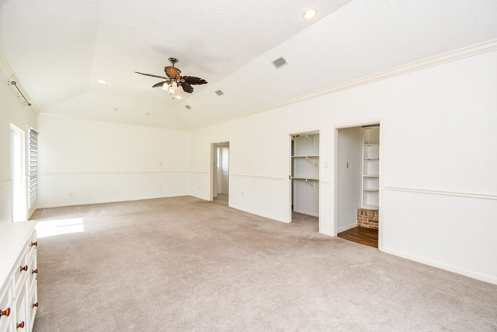 1231 Creekford Circle, Sugar Land, TX 77478 Walk-In Closet + Built-In Shelving in Primary Bedroom