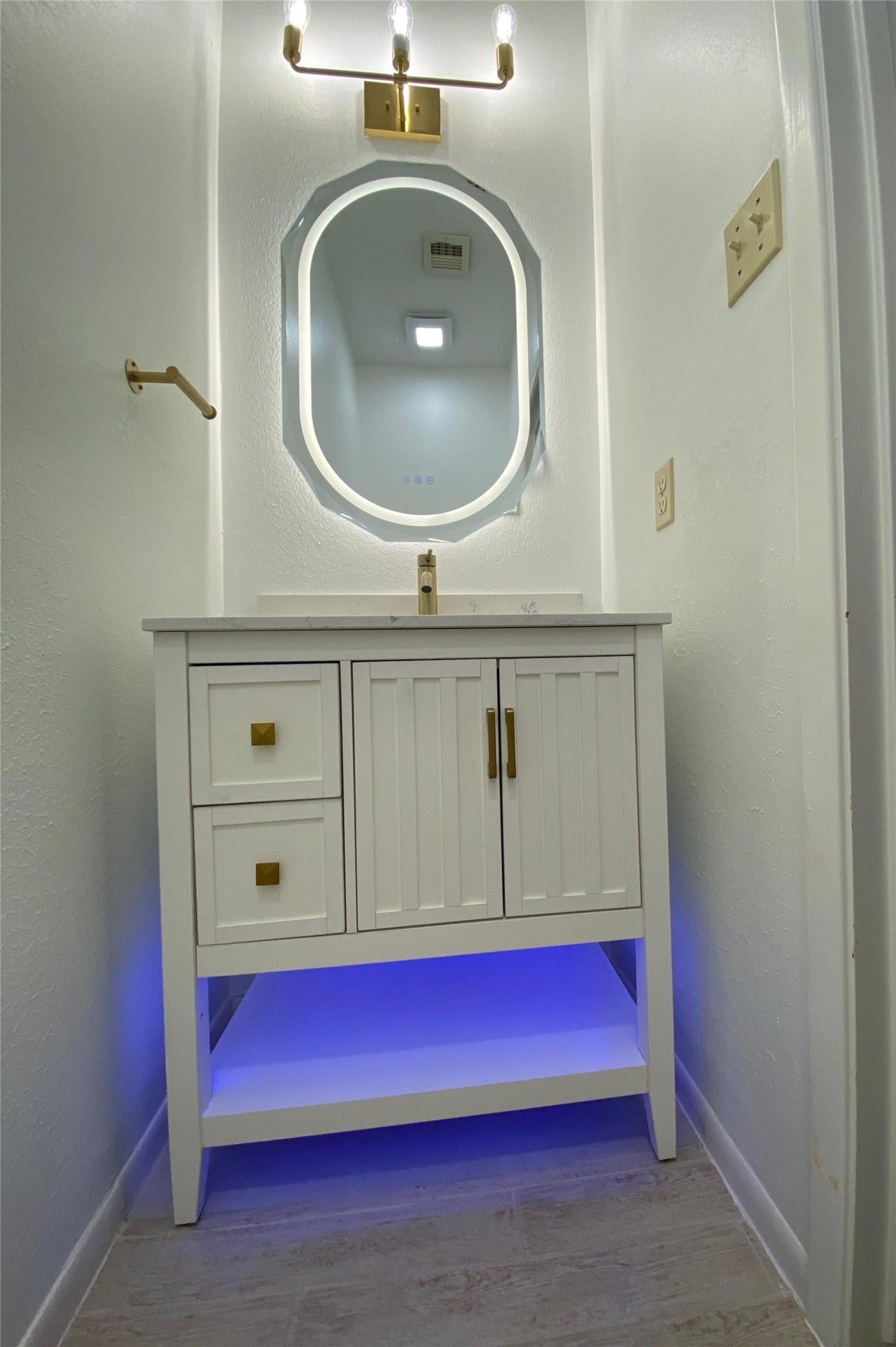 1231 Creekford Circle, Sugar Land, TX 77478 Brand new LED Mirror Vanity & Under Cabinet Lighting in Half Bath near Utility Room