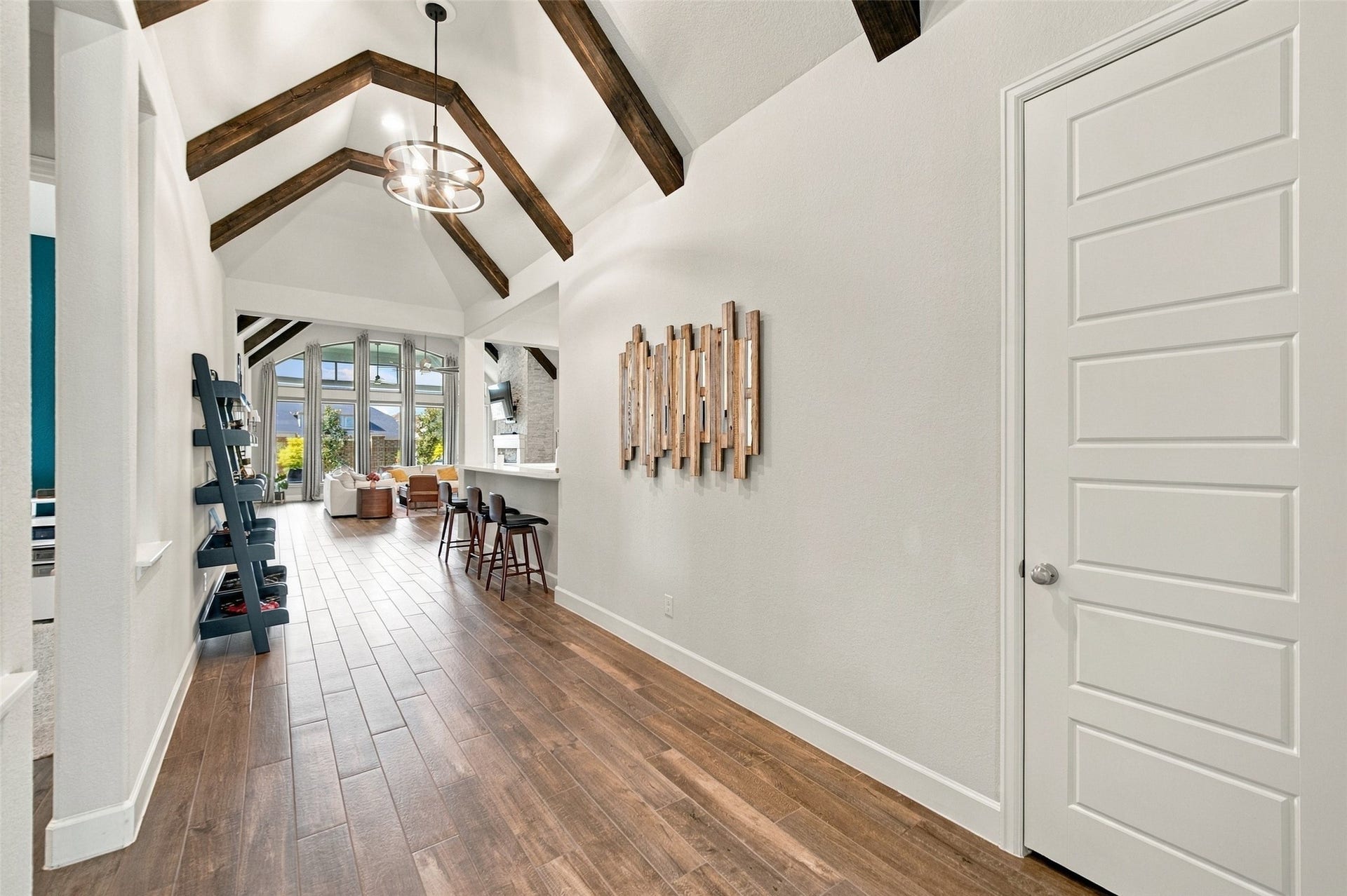 20503 Star Stable Lane, Tomball, TX 77377 Custom beams installed throughout the entry and living room make this such a beautiful home to enter and enjoy.