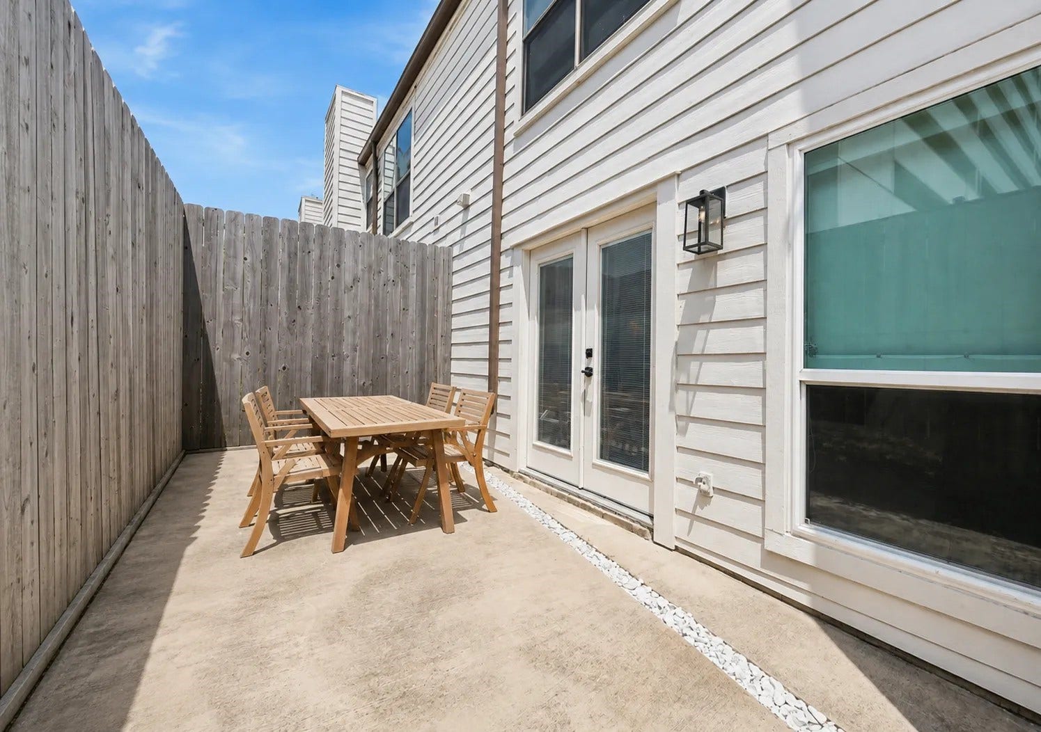 2555 Bering Drive, #11, Houston, TX 77057 Private low maintenance patio perfect for outdoor relaxation and easy entertaining.