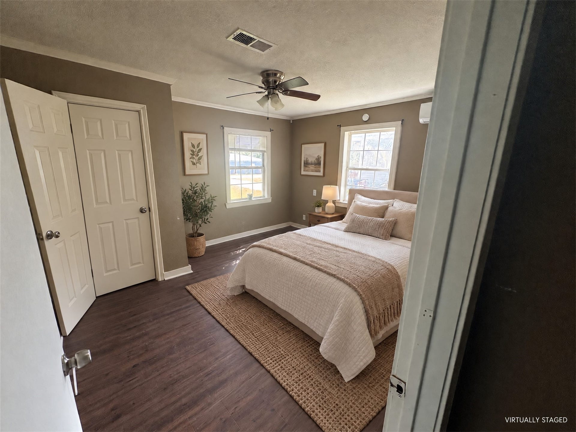 113 N Pecan Drive, Texas City, TX 77591 Virtually staged: simple furnishings show a possible bedroom arrangement without remodeling.