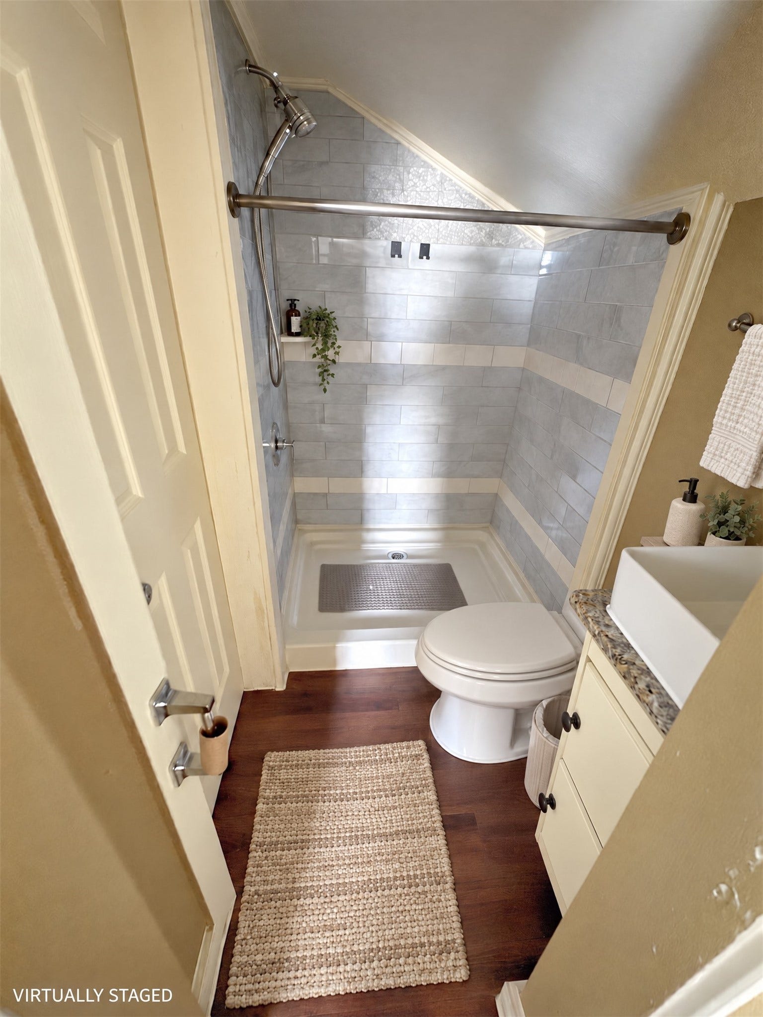 113 N Pecan Drive, Texas City, TX 77591 Virtually staged: neutral bath textiles and a small accessory complement the existing fixtures.