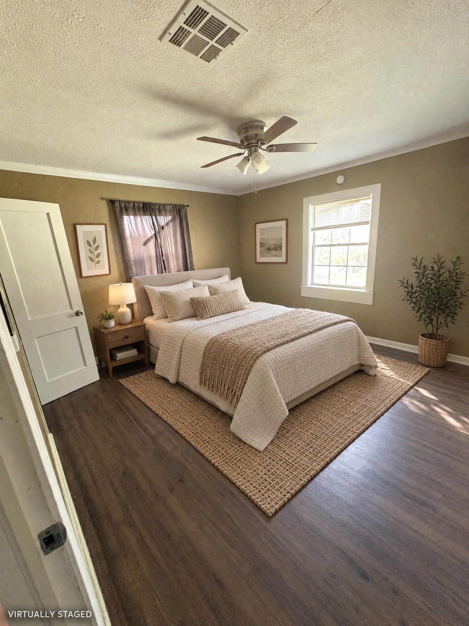 113 N Pecan Drive, Texas City, TX 77591 Virtually staged: cream bedding and a compact nightstand illustrate a bedroom arrangement.