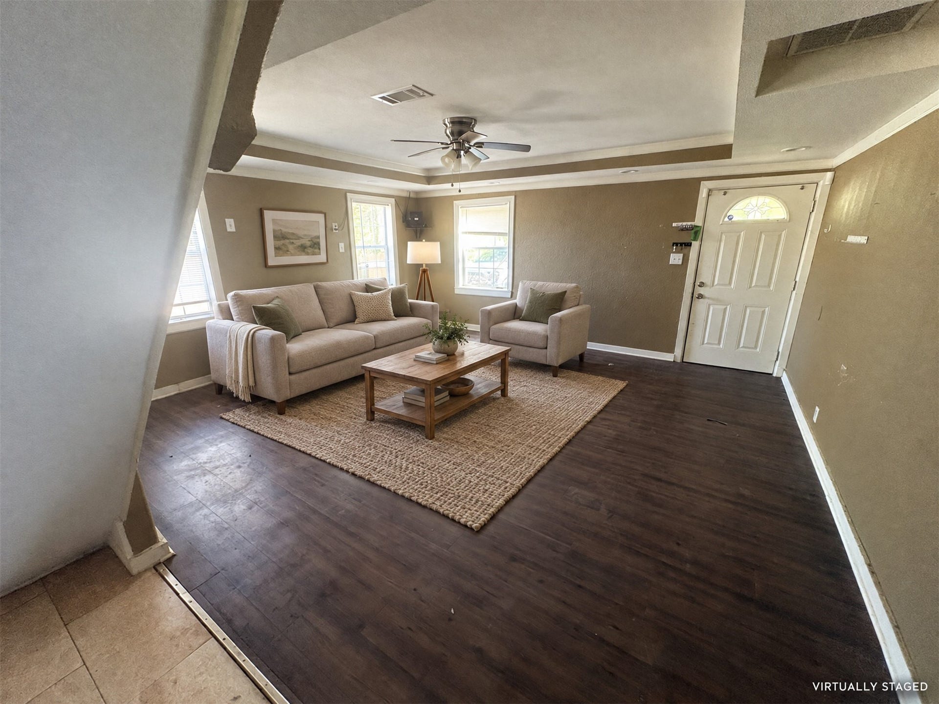 113 N Pecan Drive, Texas City, TX 77591 Virtually staged: a neutral seating arrangement illustrates one way to use the living room.
