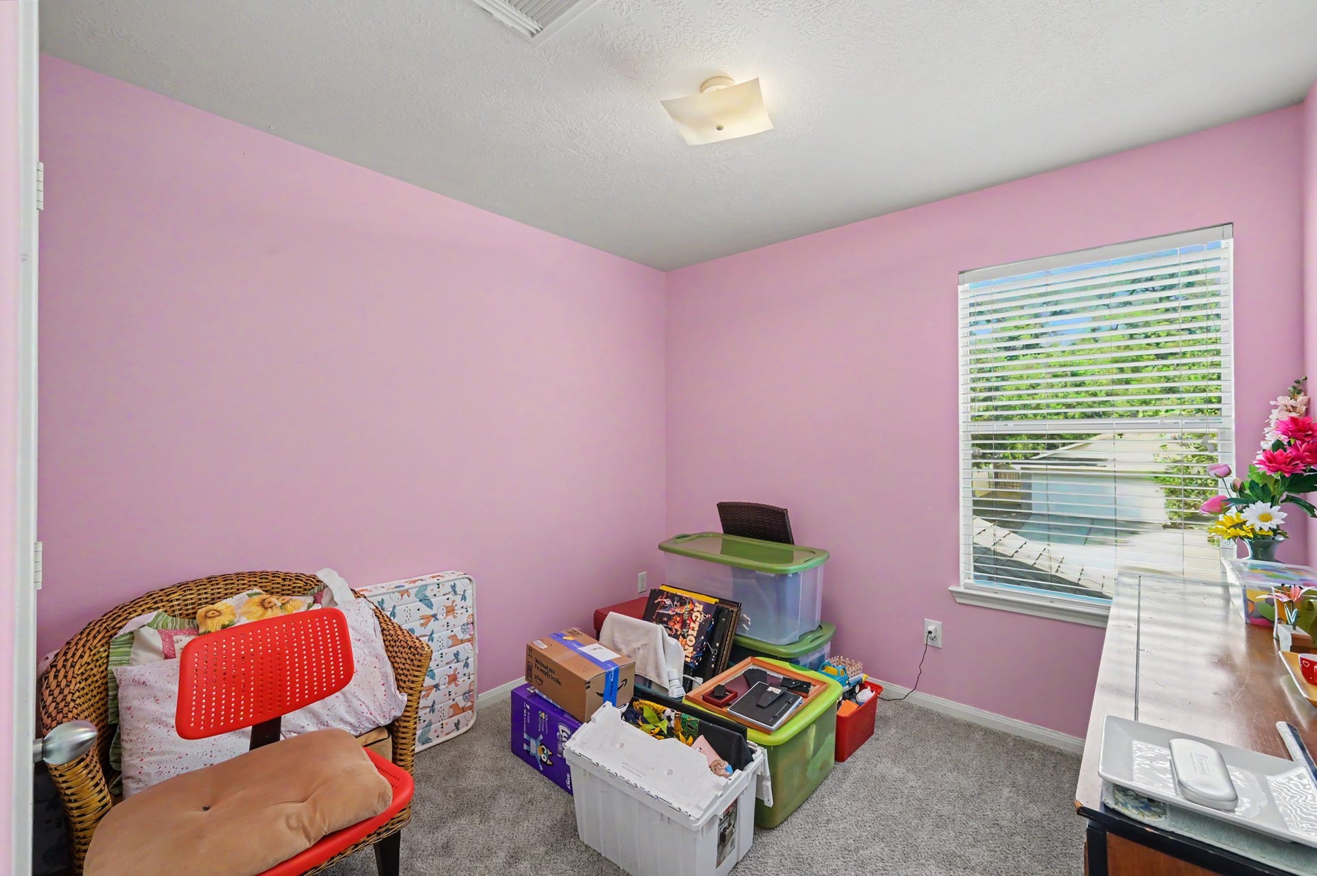 1819 Emerald Pathway Drive, Spring, TX 77388 Bedroom with cozy carpet, and abundant natural light, perfect for relaxation.