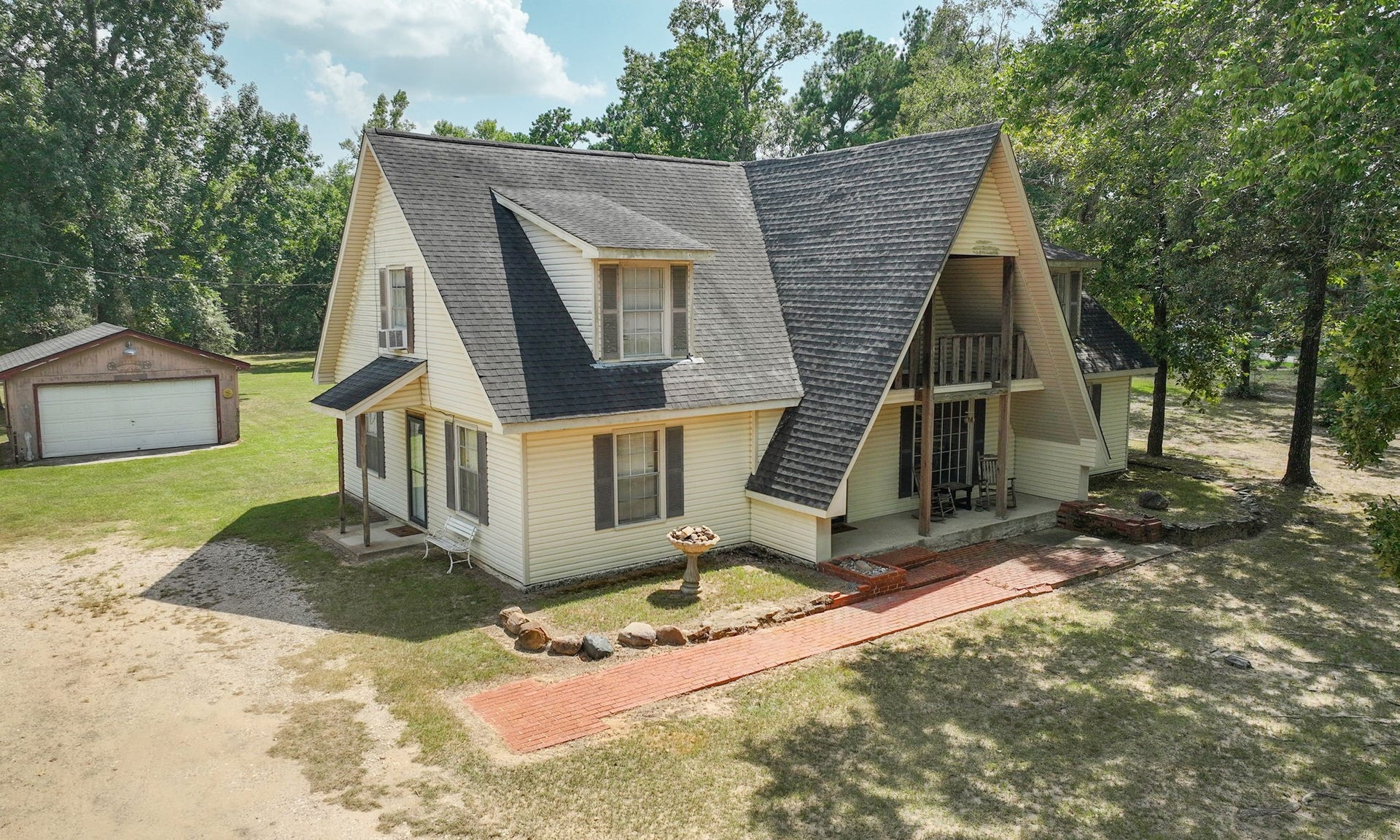 A Home Filled with Special Memories
Set far back from the road, this property offers the privacy, peaceful setting, and space to create meaningful memories of your own.